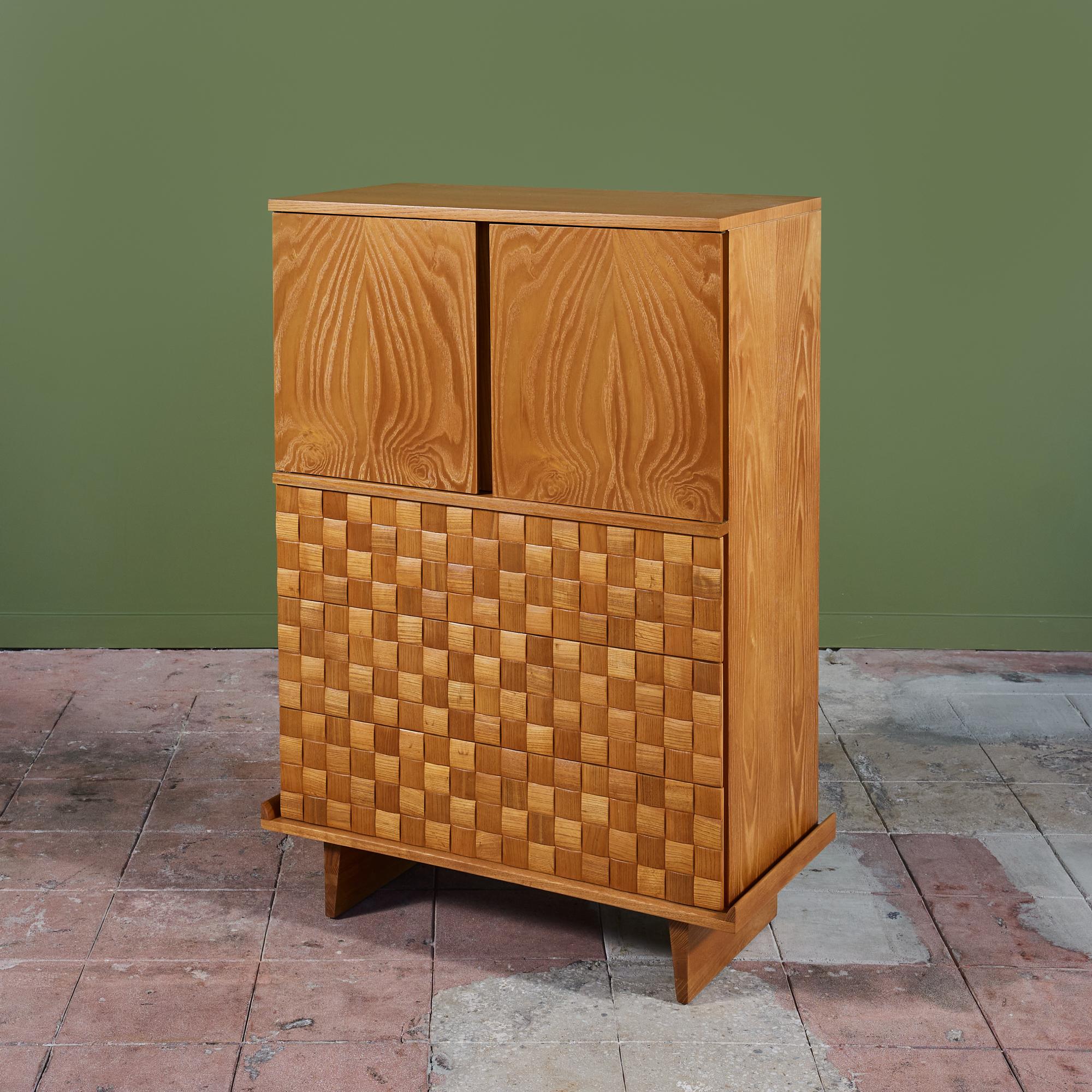 A stunning tall oak dresser designed by Paul Lazlo for Brown Saltman c.1950s, USA as part of the 