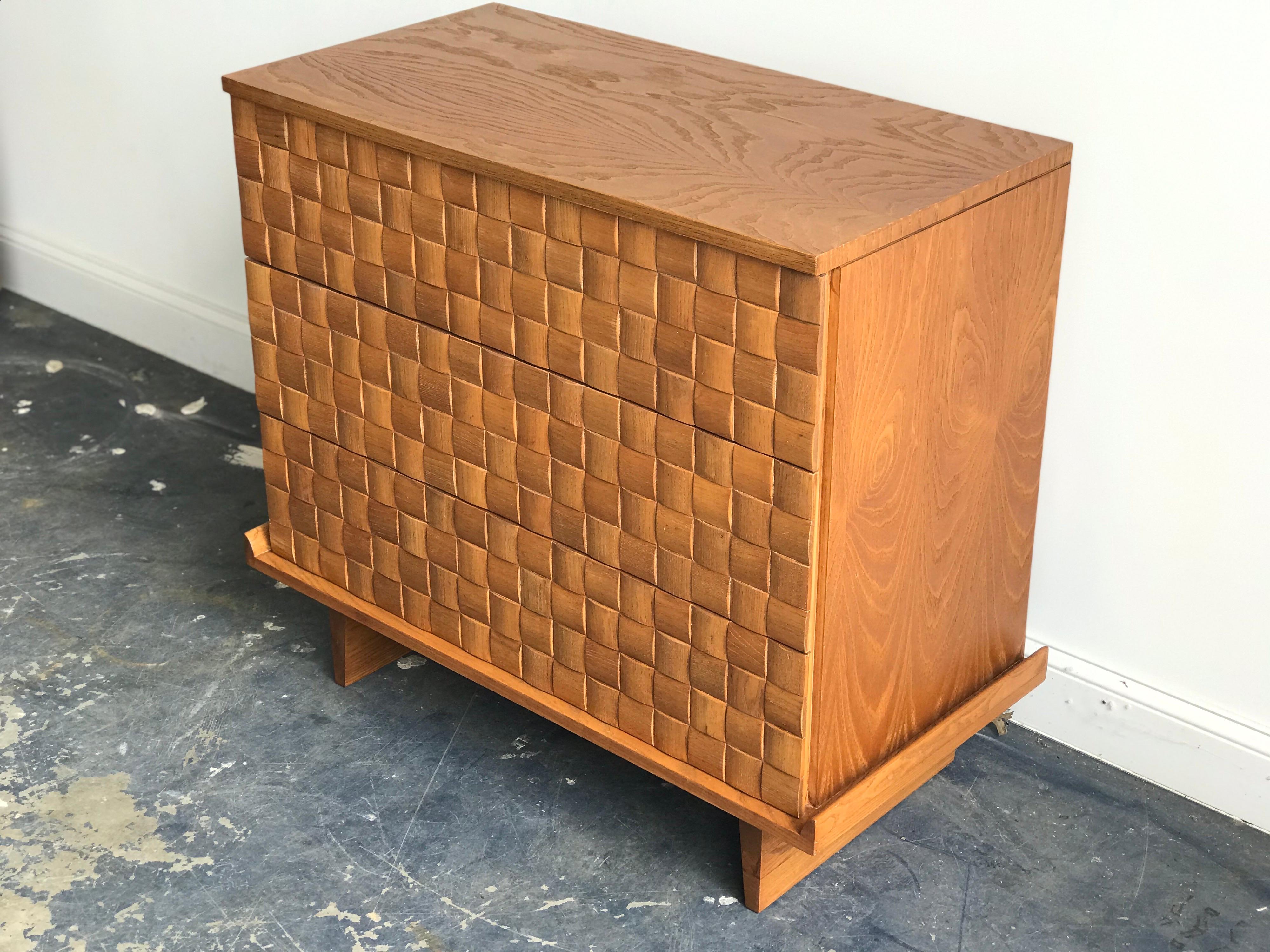 Chest of drawers in oak by Paul Laszlo for Brown Saltman. Wonderful Basketweave design on drawer fronts. Three generous sized drawers. Restored.