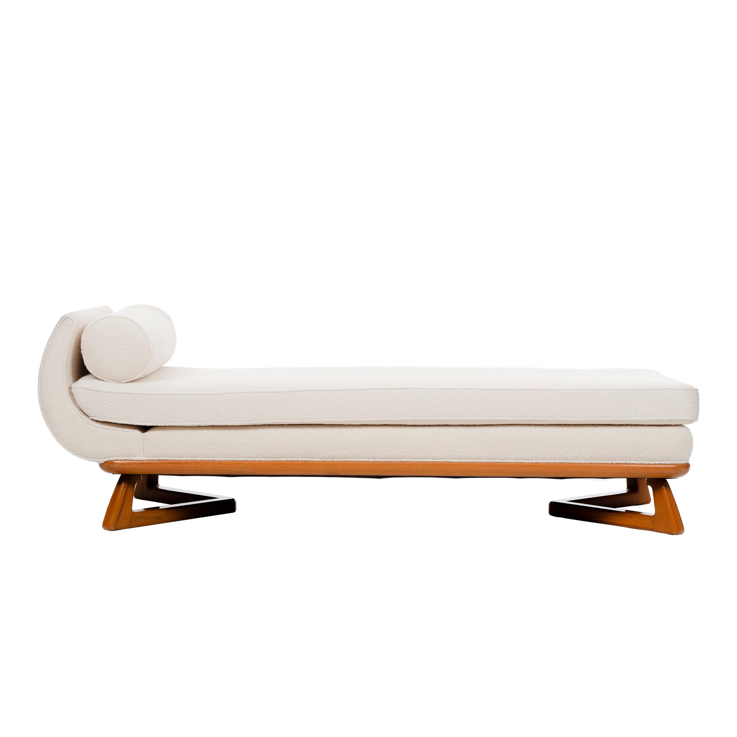 Laszlo for Brown Saltman chaise longue, solid bleached walnut trapezoid bases bridge upholstered deck and lose cushion and curved scroll end with bolster.
Reupholstered with Great Plains from Holly Hunt bouclé.
Measures: Cushion height 18.5.