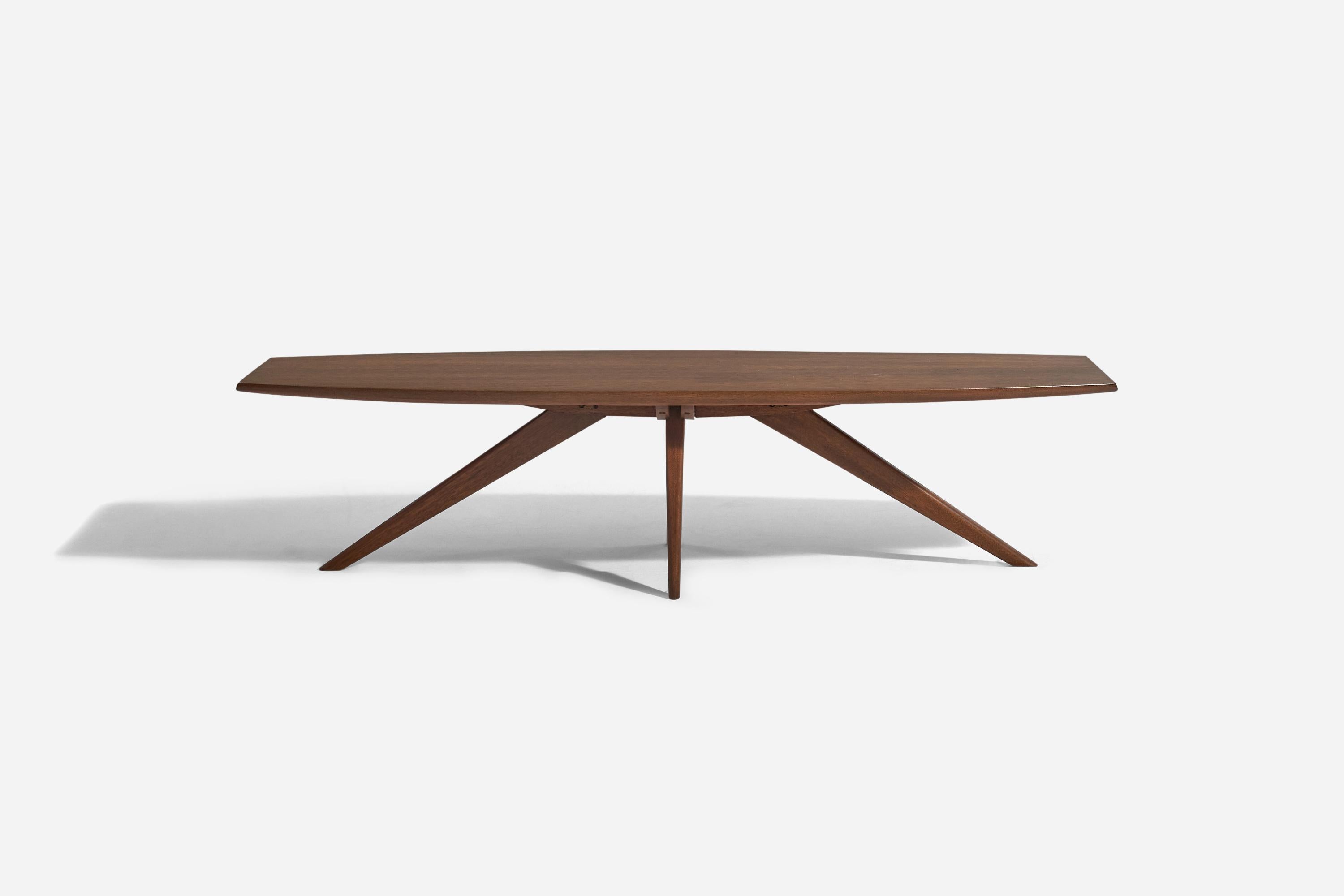 A walnut coffee table designed by Paul László and produced by Brown Saltman, America, 1950s.

