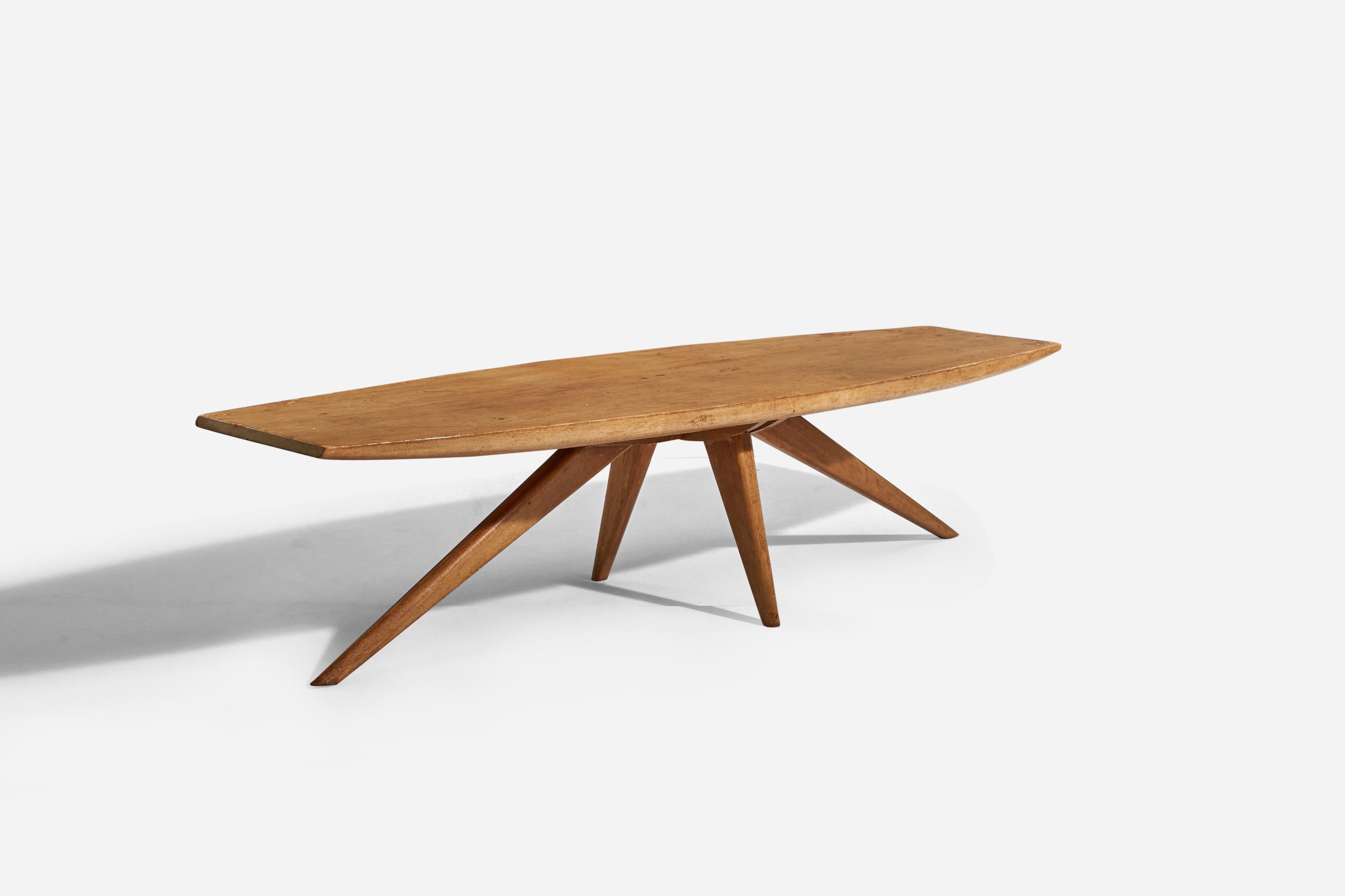 A wooden coffee table designed by Paul László and produced by Brown Saltman, America, 1950s.

