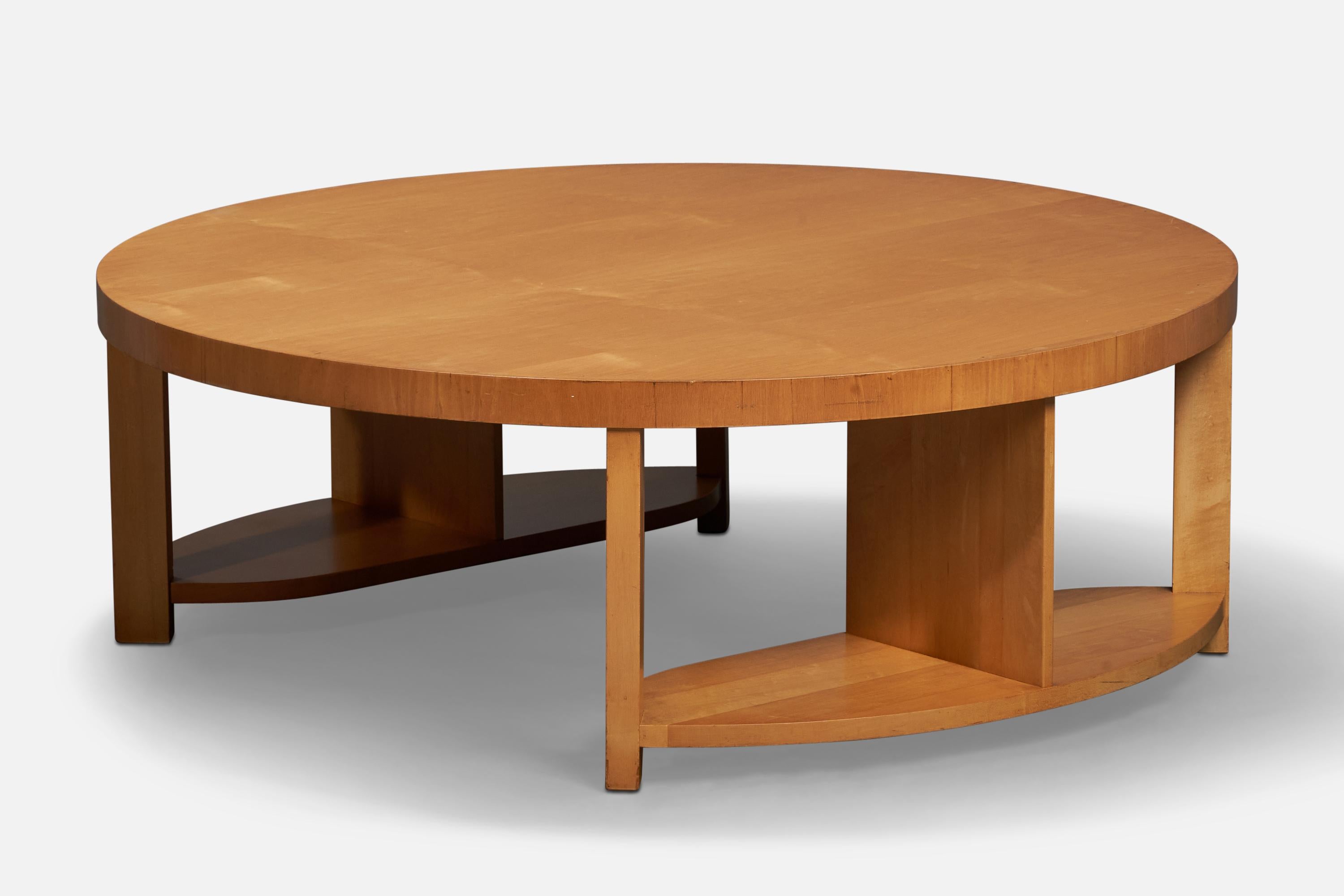 A wood coffee table designed by Paul Laszlo and produced by Brown Saltman, USA, 1950s.