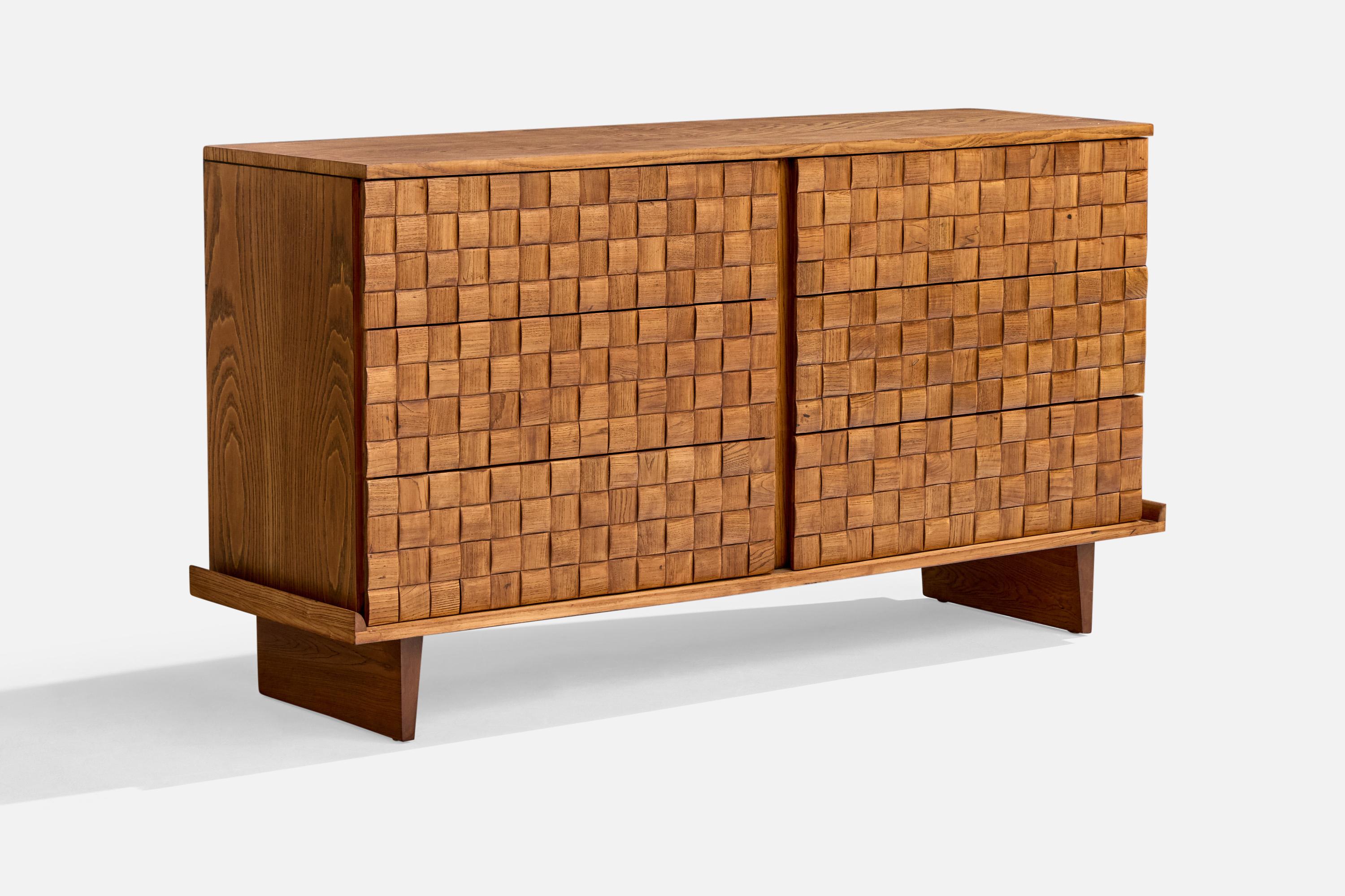 Cassettone in Oak disegnato da Paul Laszlo e prodotto da Brown Saltman, USA, anni '50.

Dimensioni complessive (pollici): 33,25 