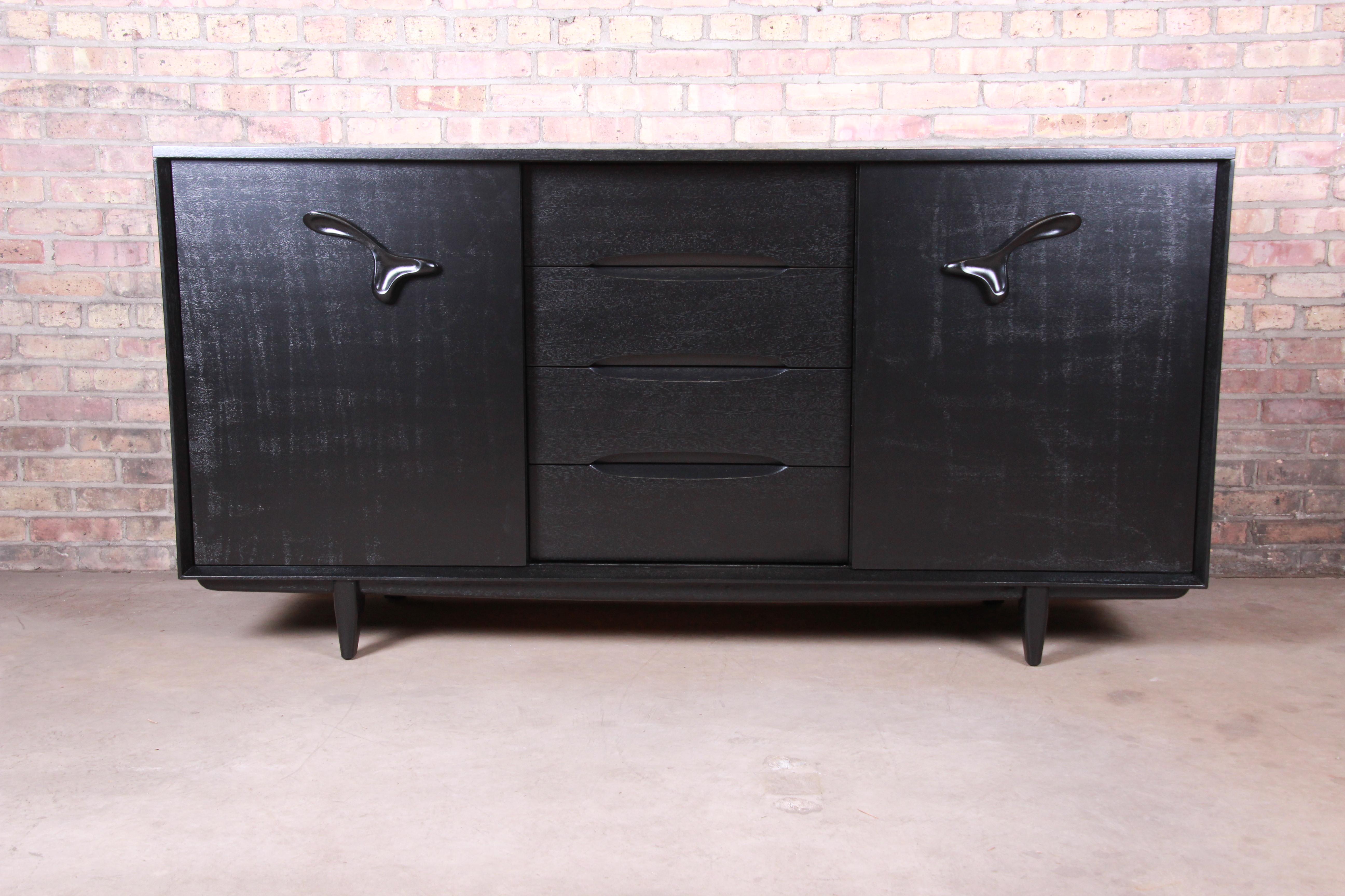 A rare and exceptional Mid-Century Modern ebonized mahogany 21-drawer 