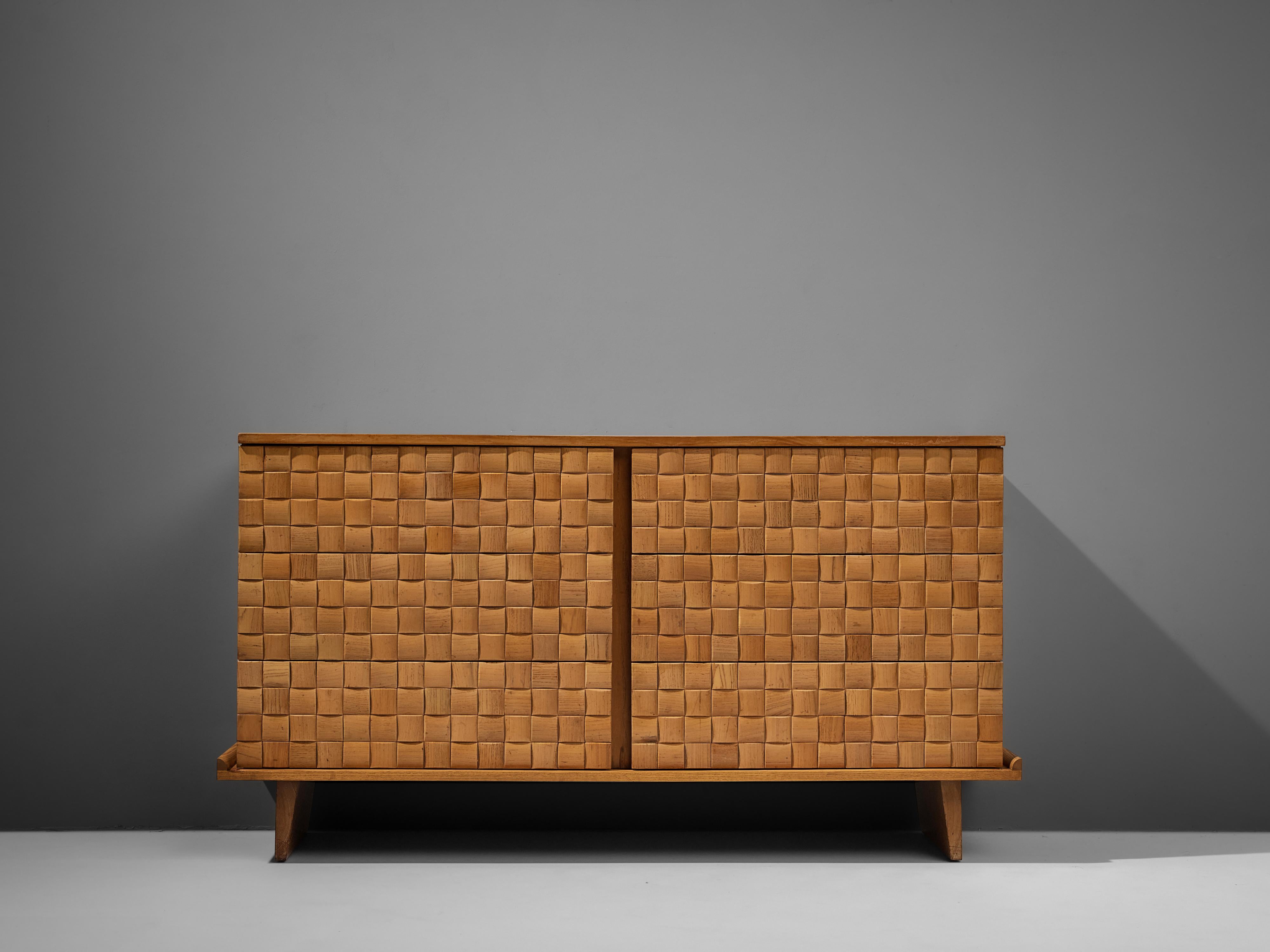 Paul László for Brown Saltman, sideboard model 1613, ash, United States, 1955 

Outstanding sideboard by Paul László in ash wood. The front of the piece is vividly structured by squared wooden elements. Not only is a rhythmic structure created that