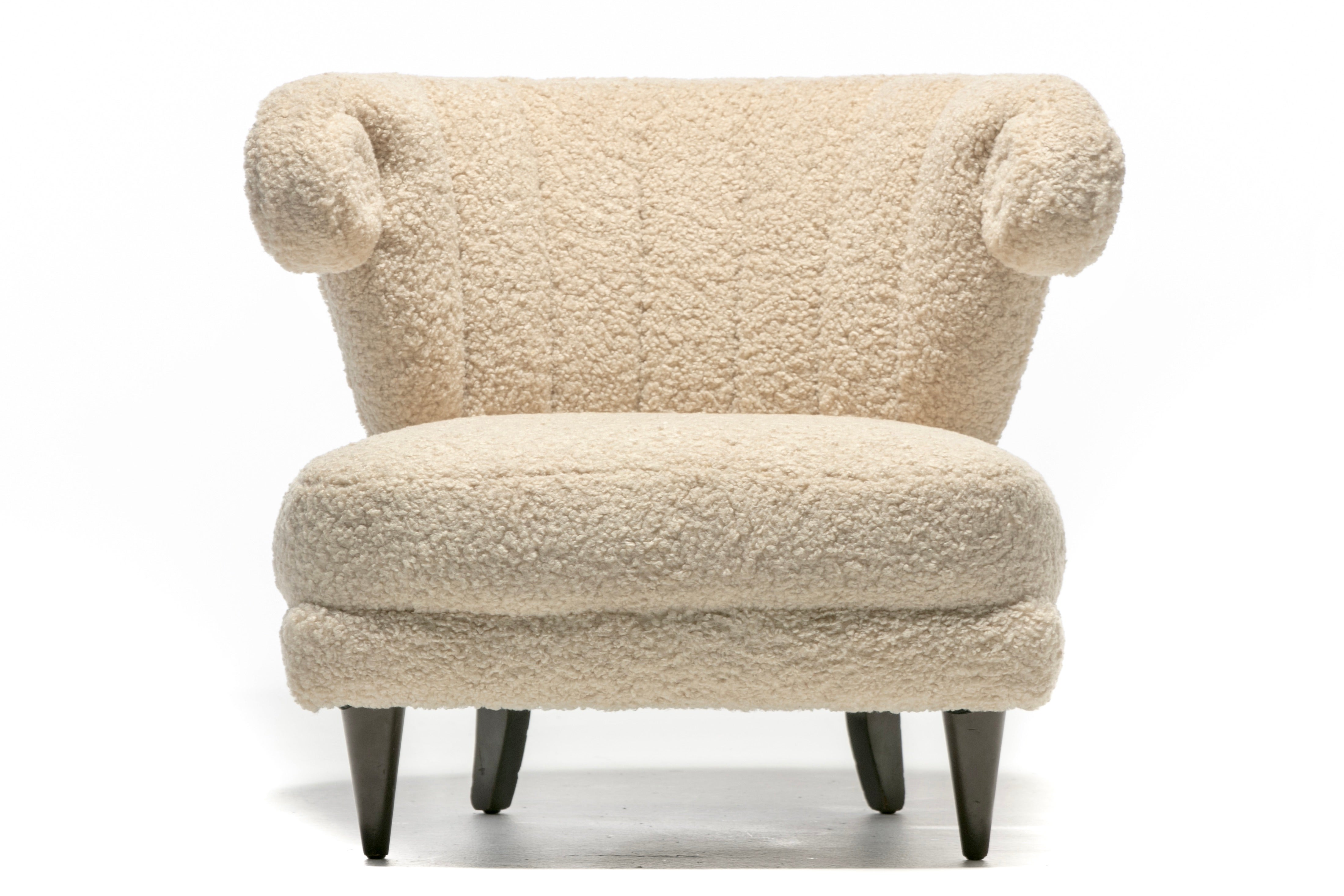 Paul Laszlo 1940s slipper chair with new super soft off white ivory bouclé upholstery. Hollywood Regency from top to bottom and side to side, this gorgeous one of a kind chair brings together lots of sexy details perfectly to create THE slipper