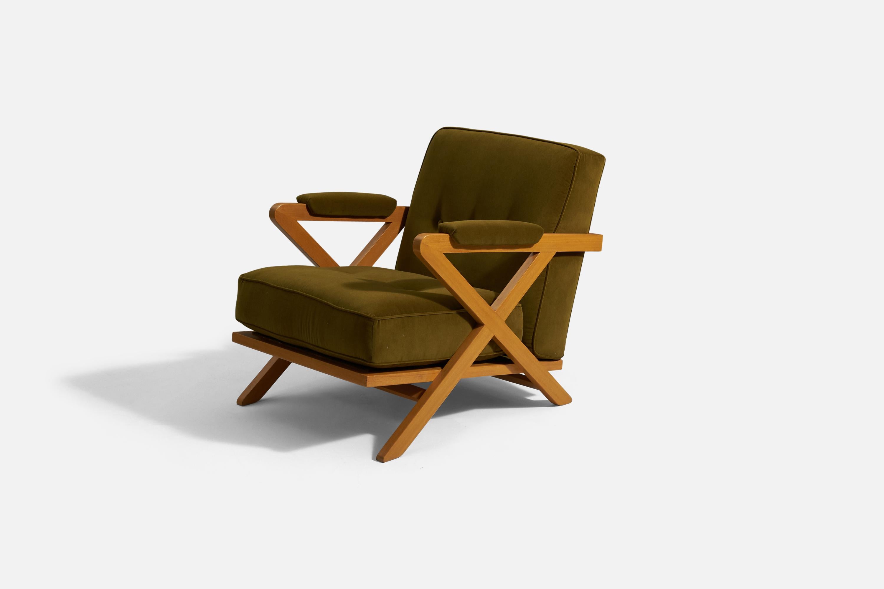 An oak and green velvet lounge chair designed by Paul László and produced by Brown Saltman, USA, 1950s.

