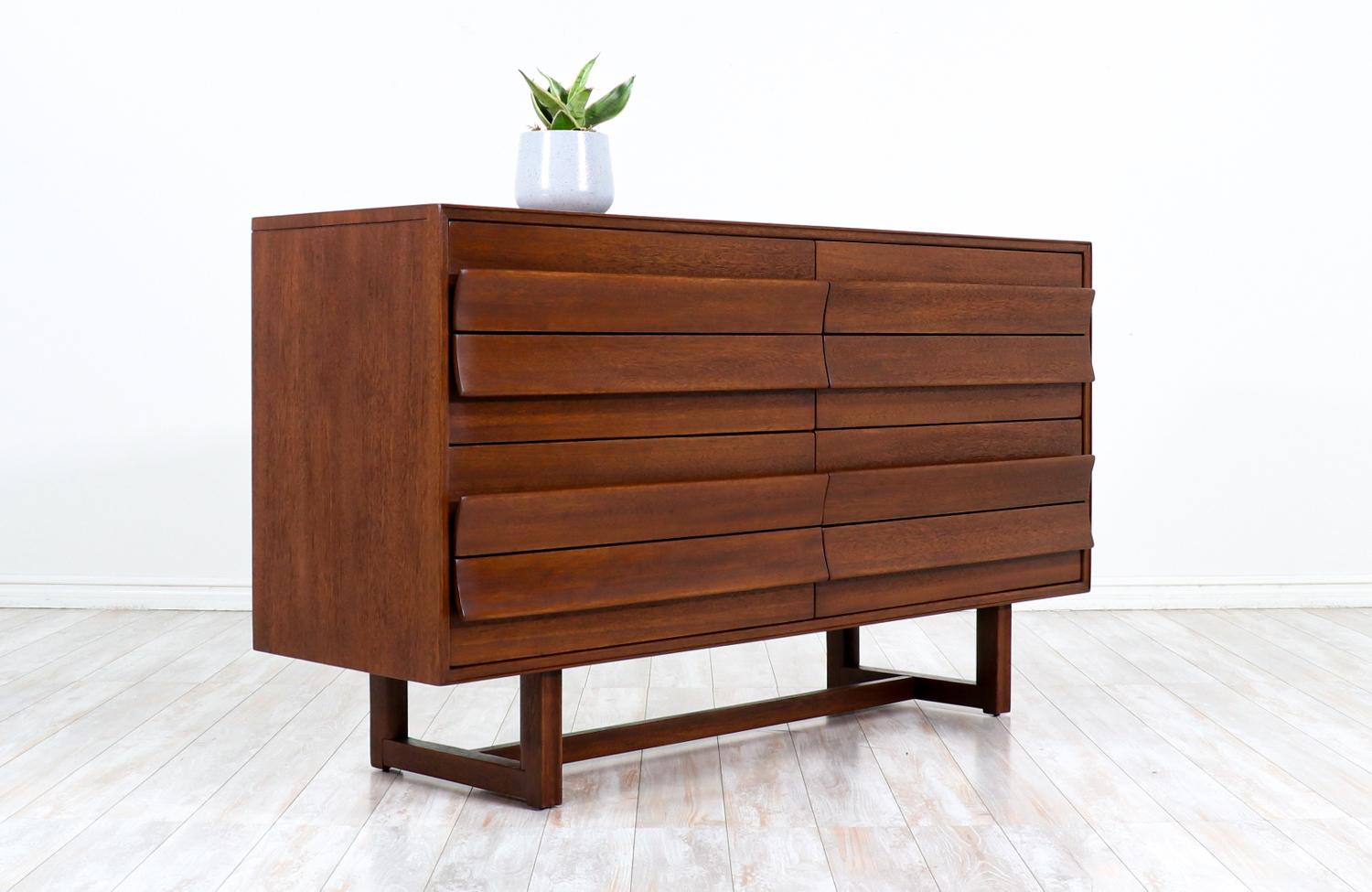 Paul Laszlo sculpted 8-drawer dresser for Brown Saltman.