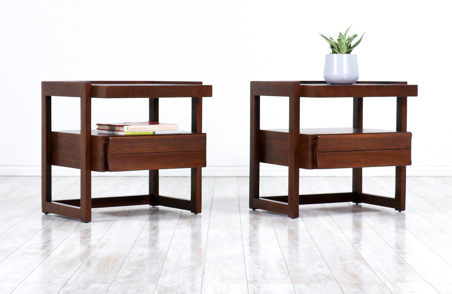 Paul Laszlo two-tier mahogany night stands for Brown Saltman.