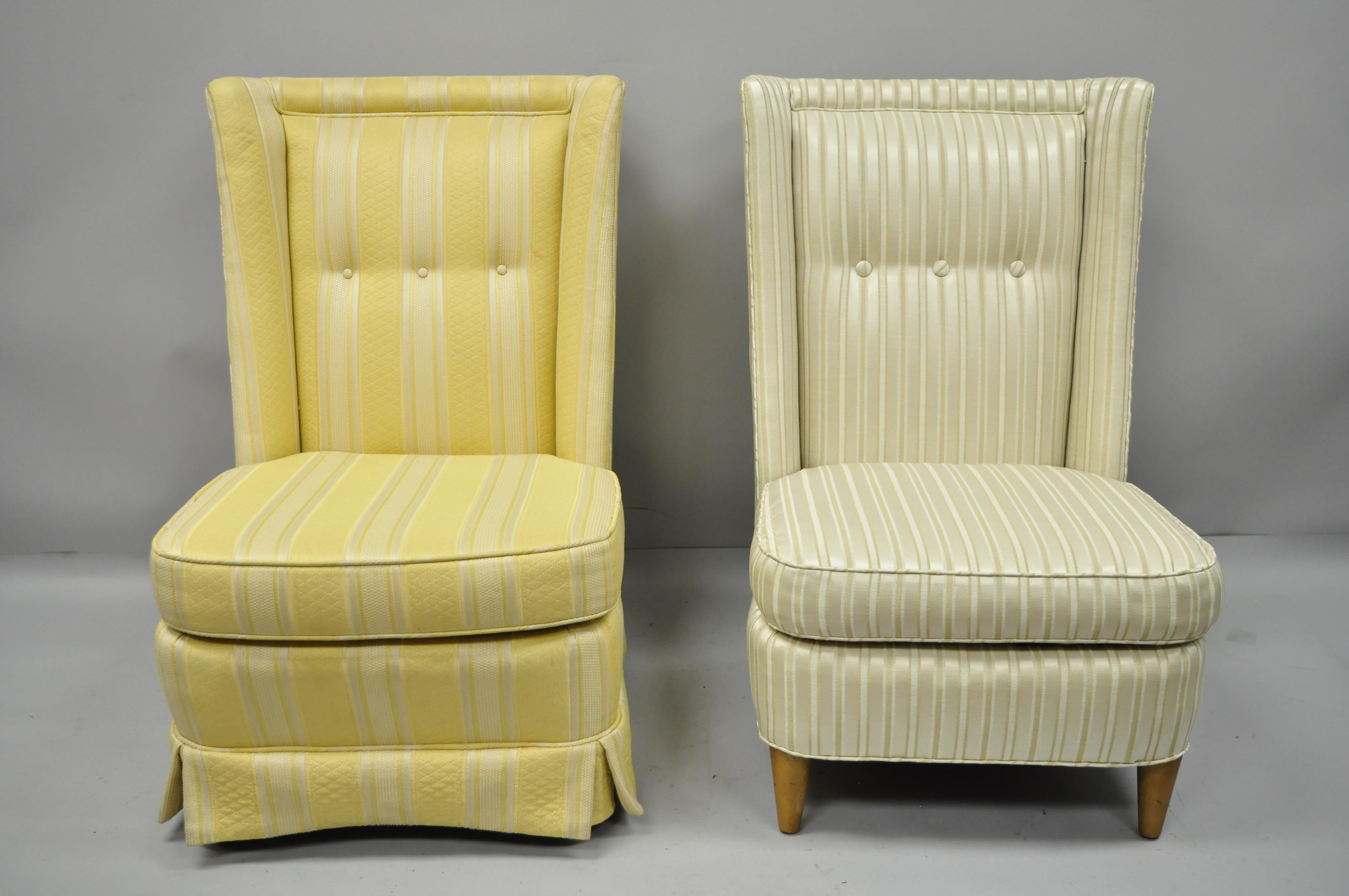 A pair of Paul Laszlo upholstered barrel back lounge chairs. Item features fully upholstered barrel backs, heavy solid wood construction, short tapered legs, and clean modernist lines, circa 1950. Measurements: 36