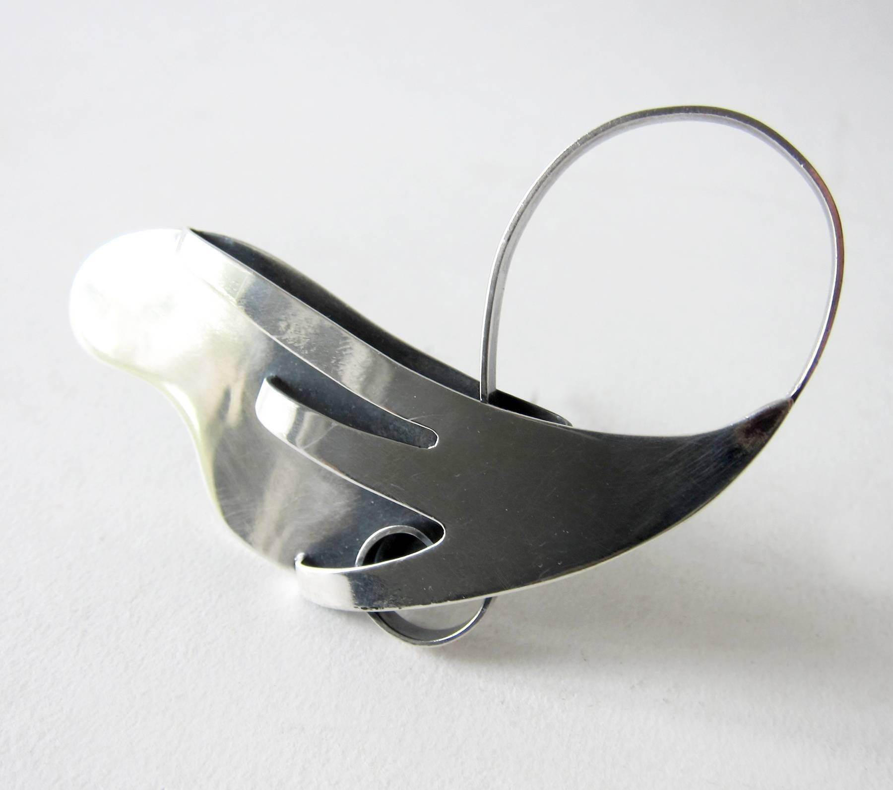 Large scale sterling silver organic modernist brooch created by Paul Lobel of New York City, New York.  Brooch measures 3.5