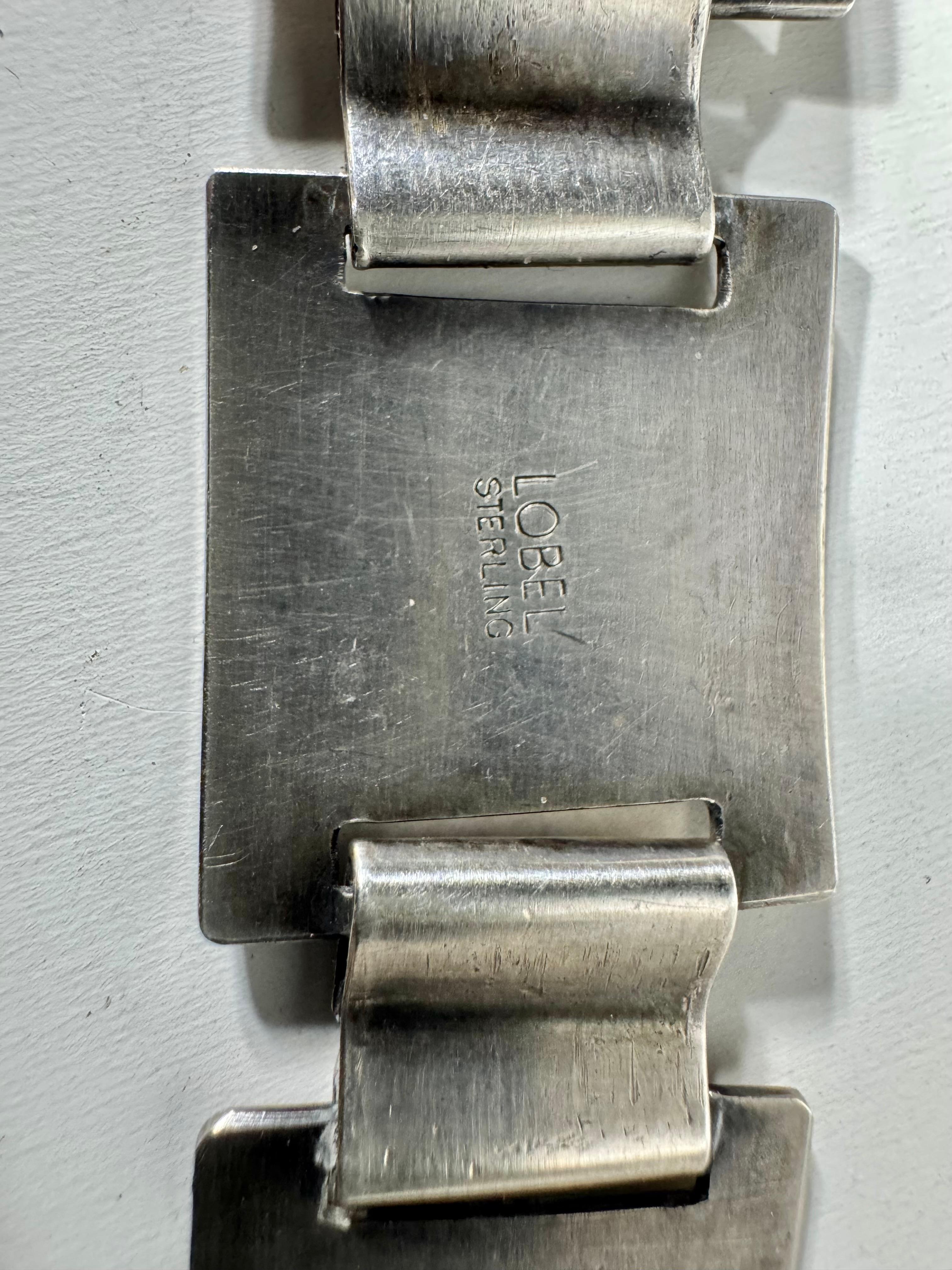  Sterling silver organic modernist bracelet created by Paul Lobel of New York City, New York. Brooch signed Lobel, Sterling on reverse. In very good vintage condition.