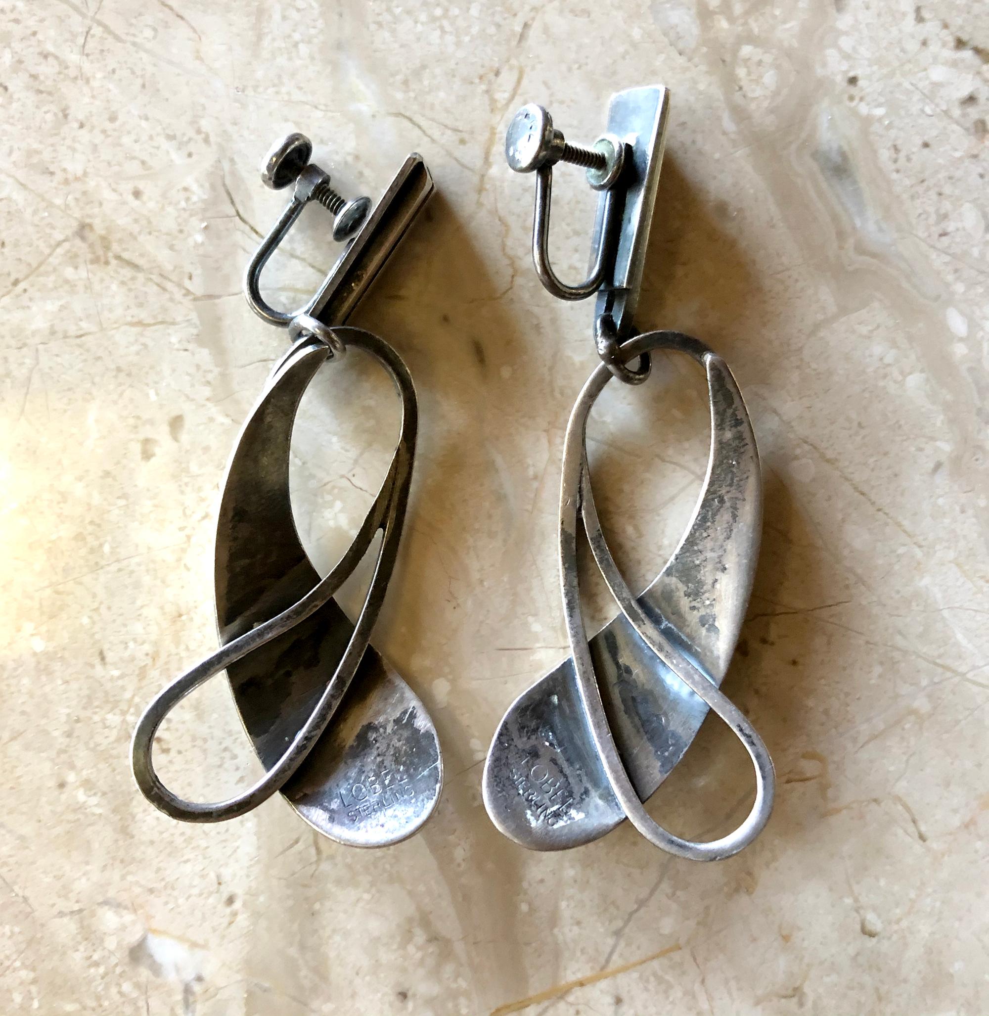 Sterling silver modernist screw back earrings created by Paul Lobel of New York, New York.  Earrings measure 2.5