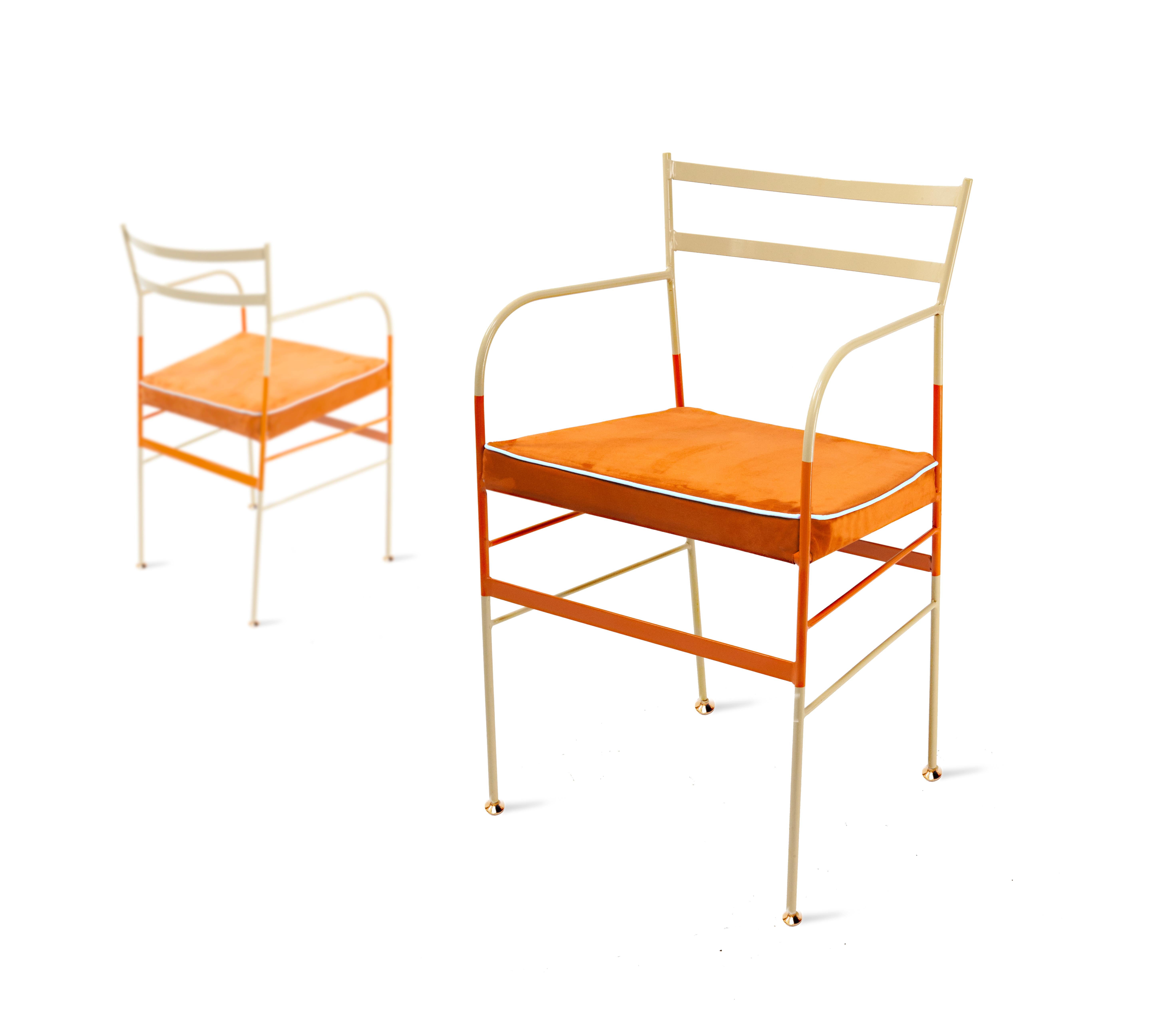 Suede piping on contrasting bright tones produces a neo-retro quality, finished with a uniquely organic compound paint and polish to prevent rust. Handcrafted in Italy from high-strength iron, these garden chairs by Sotow boast practicality and