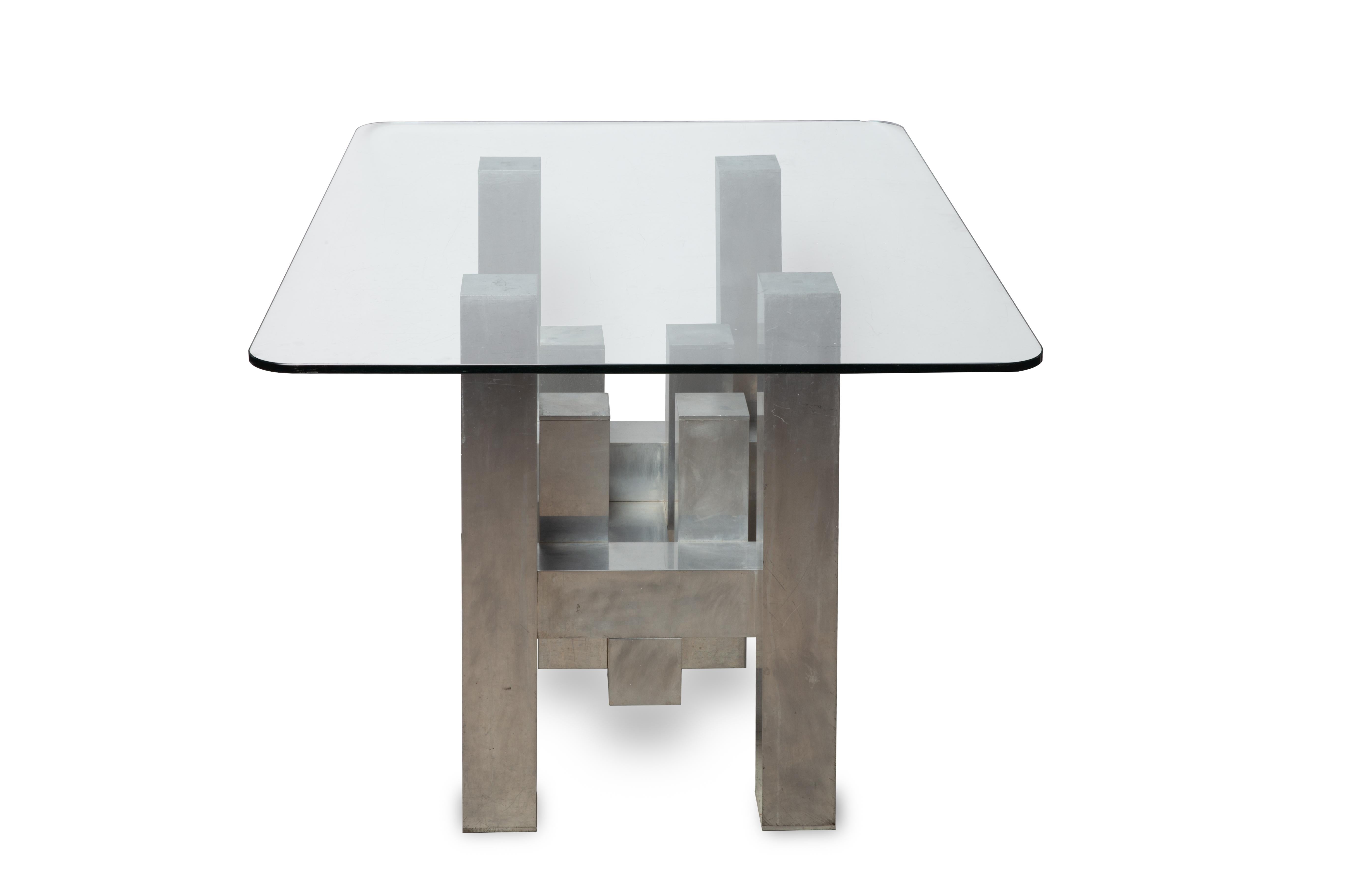 The Mid-Century Modern Paul Skyscraper aka Cityscape table designed for Habitat is one of his best designs. Its as much a sculpture as it is a functional table. I have seen the base placed on its side as well as in the position we chose upside down,