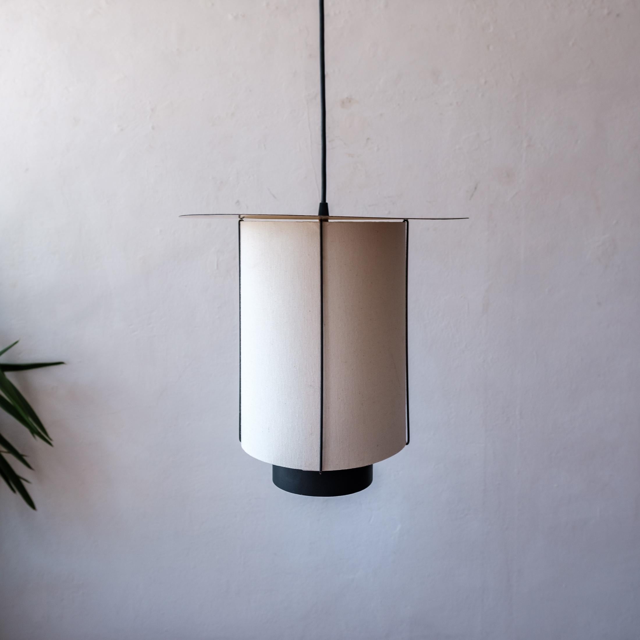 Midcentury hanging lamp by Paul Mayen for Habitat Associates. Selected and shown at the 1953 Museum of Modern Art Good Design exhibition. Enameled metal frame and reflector with a linen shade. Pull switch.