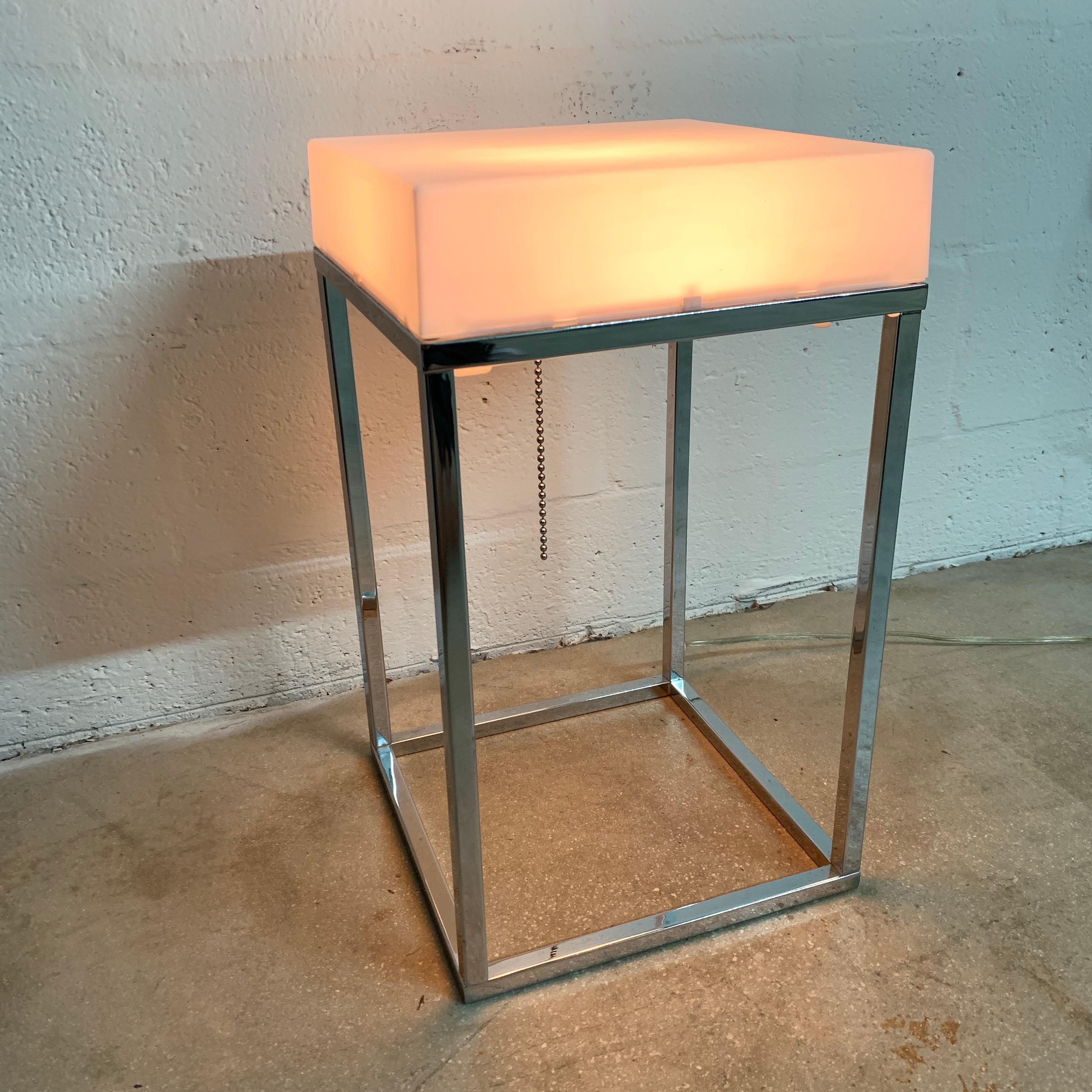 Versatile lighted table or table or floor lamp rendered in chrome and white plastic by Paul Mayen for Habitat.