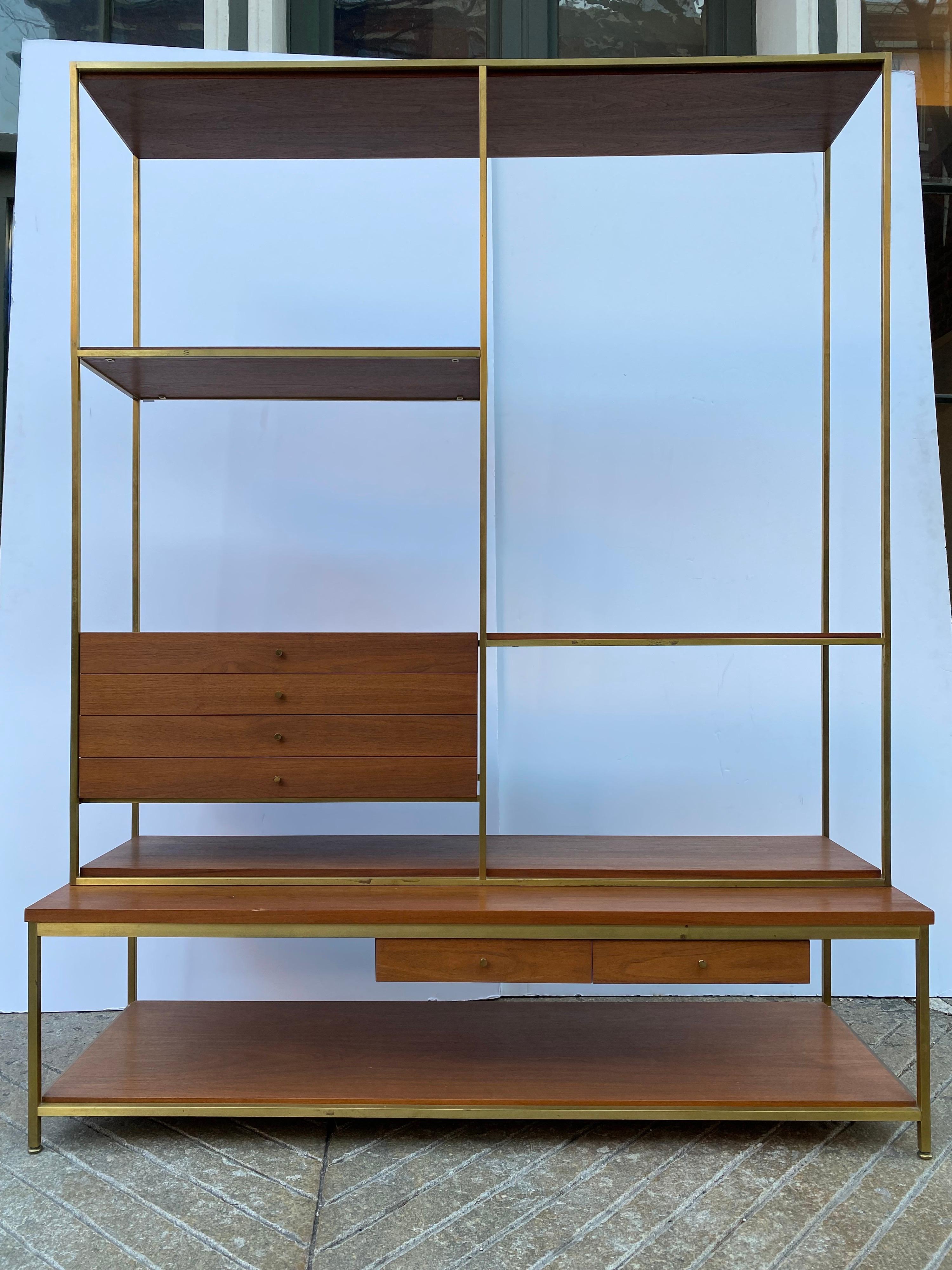Paul McCobb for Calvin room divider or shelf system. Bleached mahogany with a square brass frame that holds the shelves and drawers. In excellent original condition. Brass shows a nice even patina and wood is in very good condition. This piece can