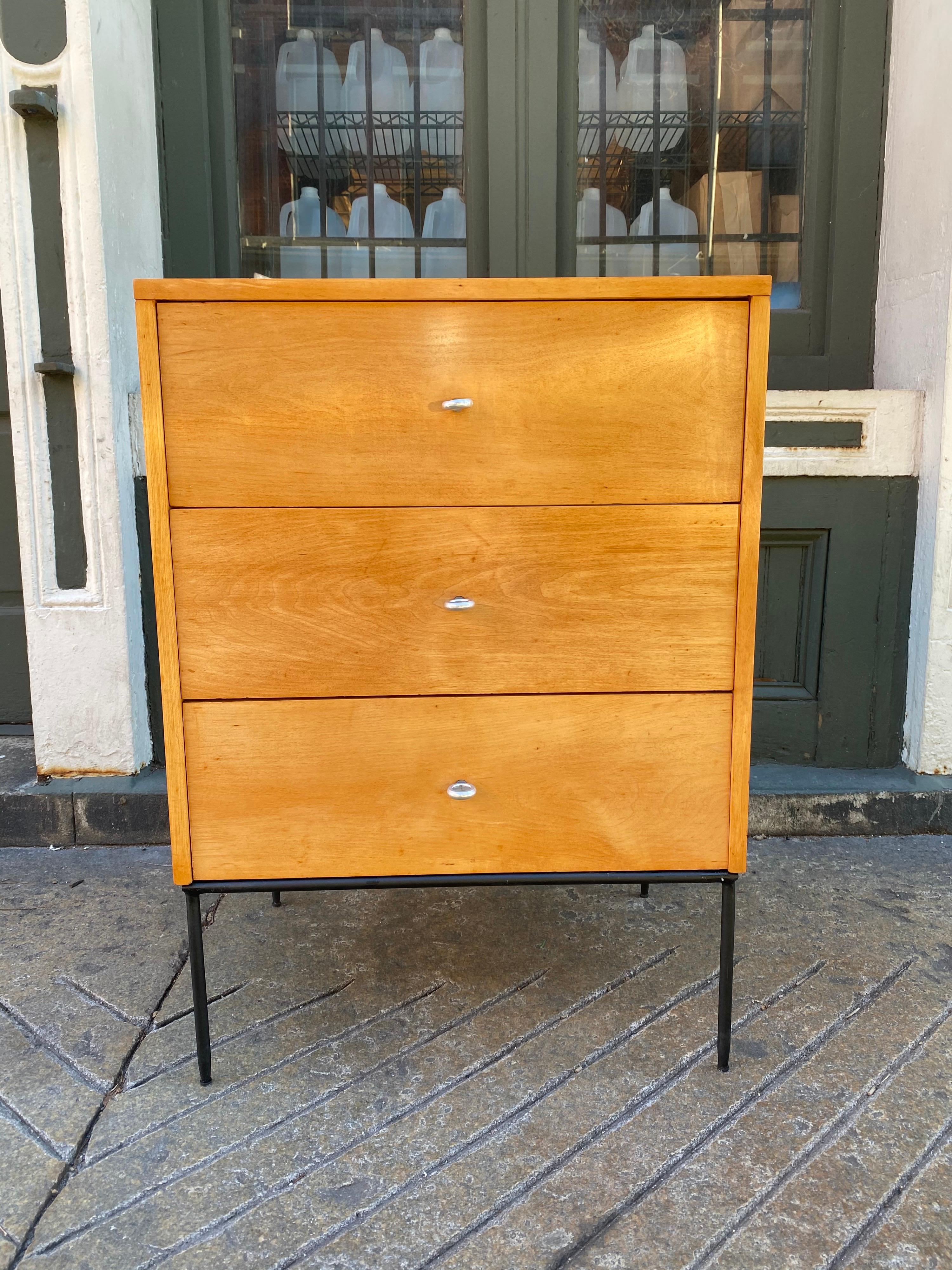 Paul McCobb 3 drawer planner group cabinet or dresser on a metal base, originally designed in 1948 for the Winchendon furniture company. Drawers have the iconic aluminum ring pulls. Recently refinished. Planner group furniture is made from solid