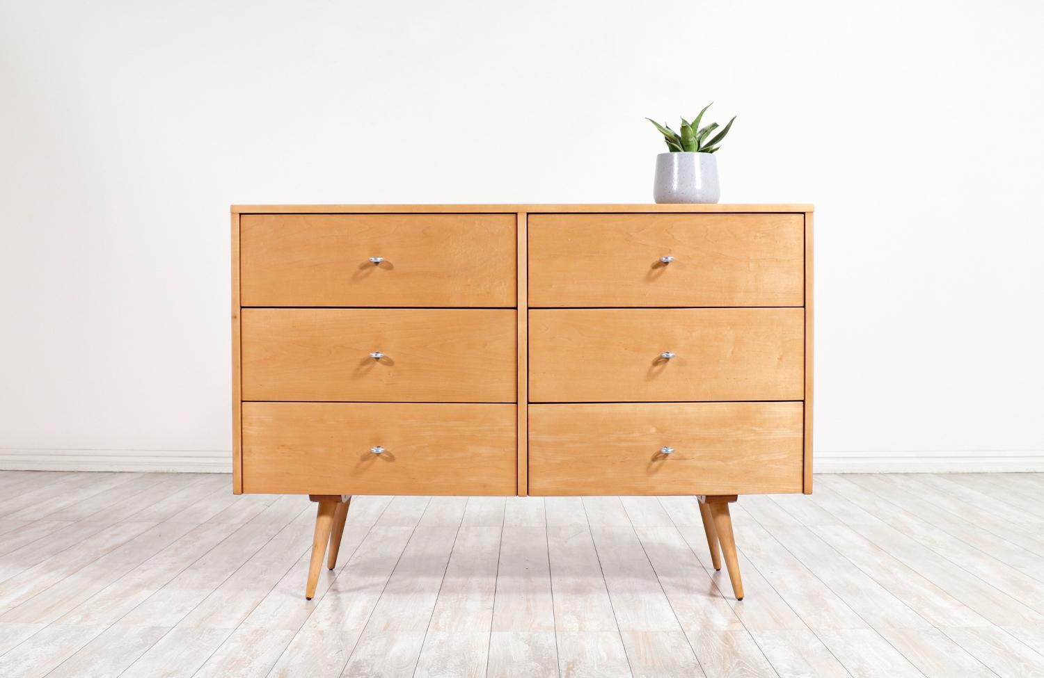 Paul McCobb 6-drawer dresser for winchendon furniture.

________________________________________

Transforming a piece of Mid-Century Modern furniture is like bringing history back to life, and we take this journey with passion and precision. With