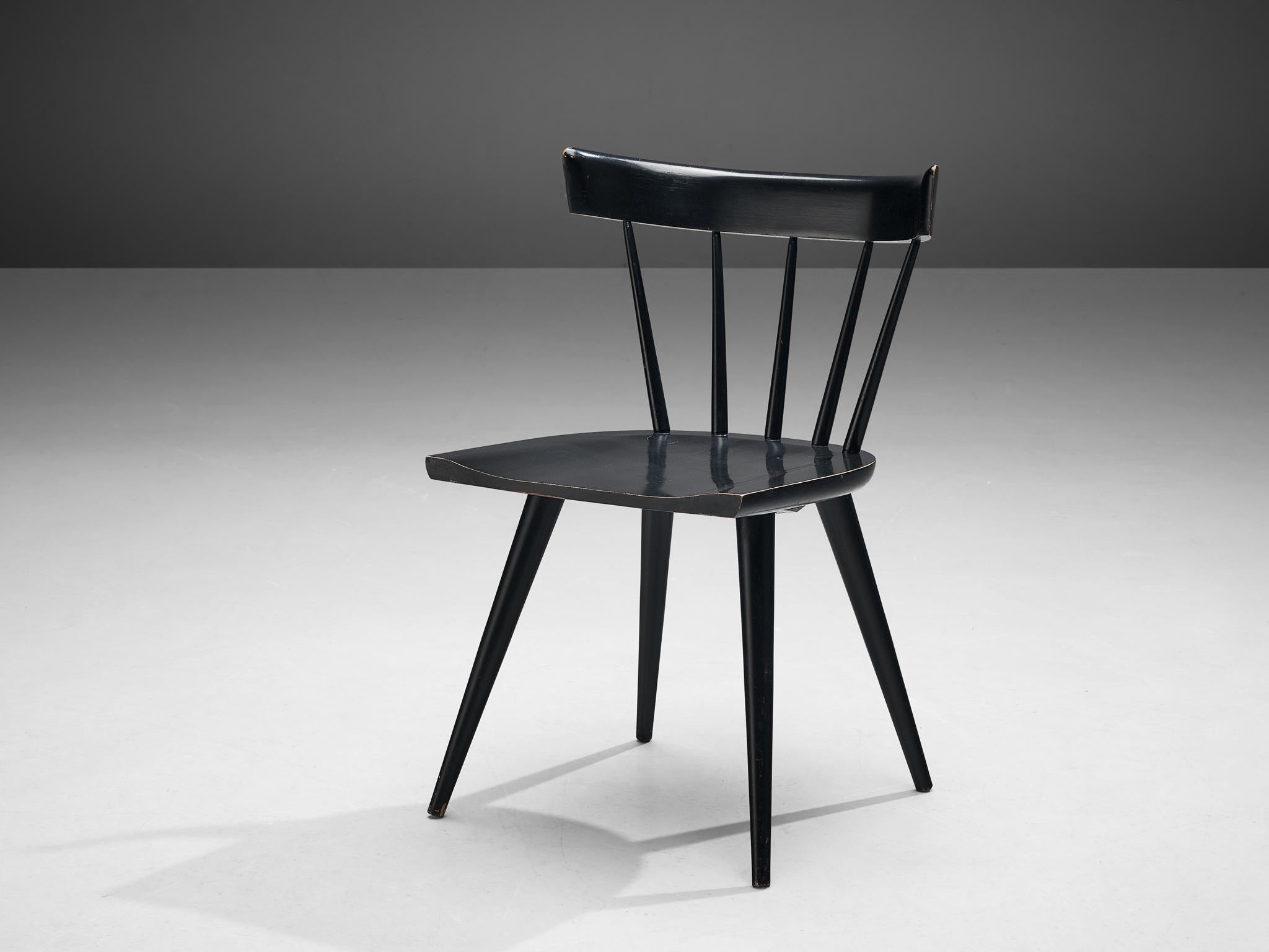 Paul McCobb, side chair, birch, United States, 1950s

Beautifully black Paul McCobb side chair. This well-composed chair combines aesthetics with comfort. A curved backrest held by thin spindles supports the sitter's back. A comfortably carved