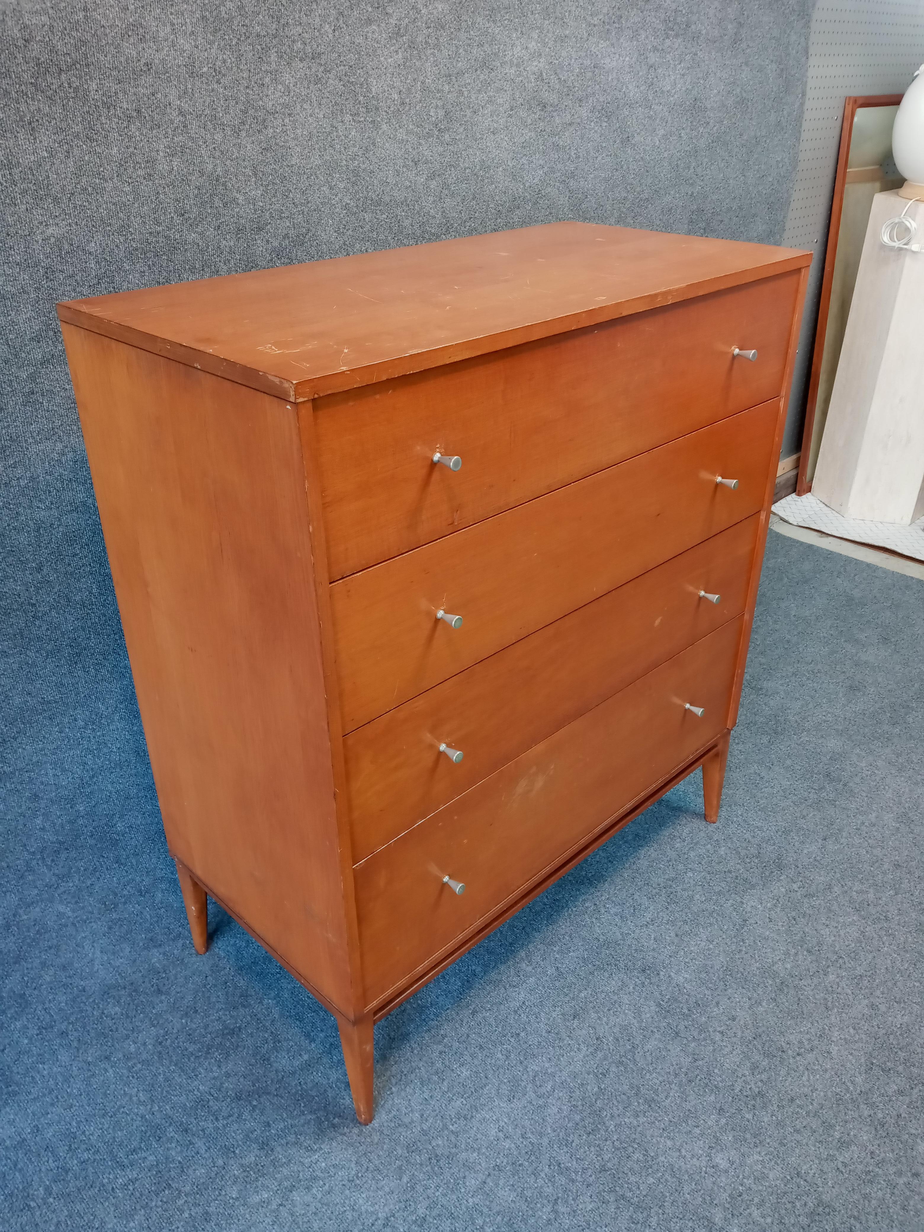 A practical and stylish Paul McCobb Planner Group for Winchendon solid maple tall 4-drawer dresser with original finish intact. All drawers work well, with clean interiors. No breaks or repairs. Original finish shows age-appropriate scuffs,
