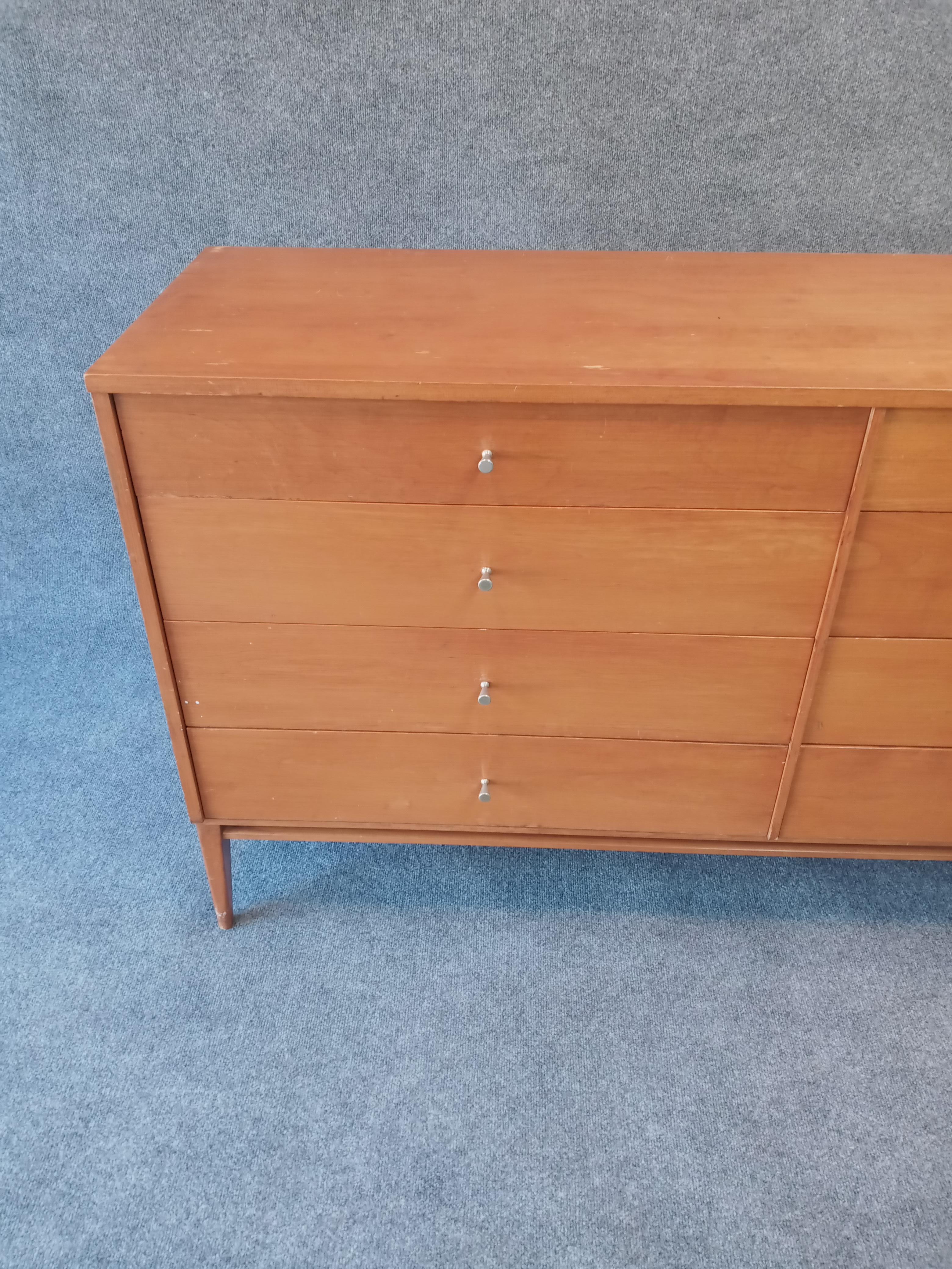 A very practical Paul McCobb Planner Group for Winchendon solid maple 8-drawer dresser with original finish intact. All drawers work well, with clean interiors. No breaks or repairs. Original finish shows age-appropriate scuffs, scratches, and minor