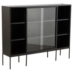 Paul McCobb Bookcase in New Black Finish with Sliding Glass Doors on Iron Base