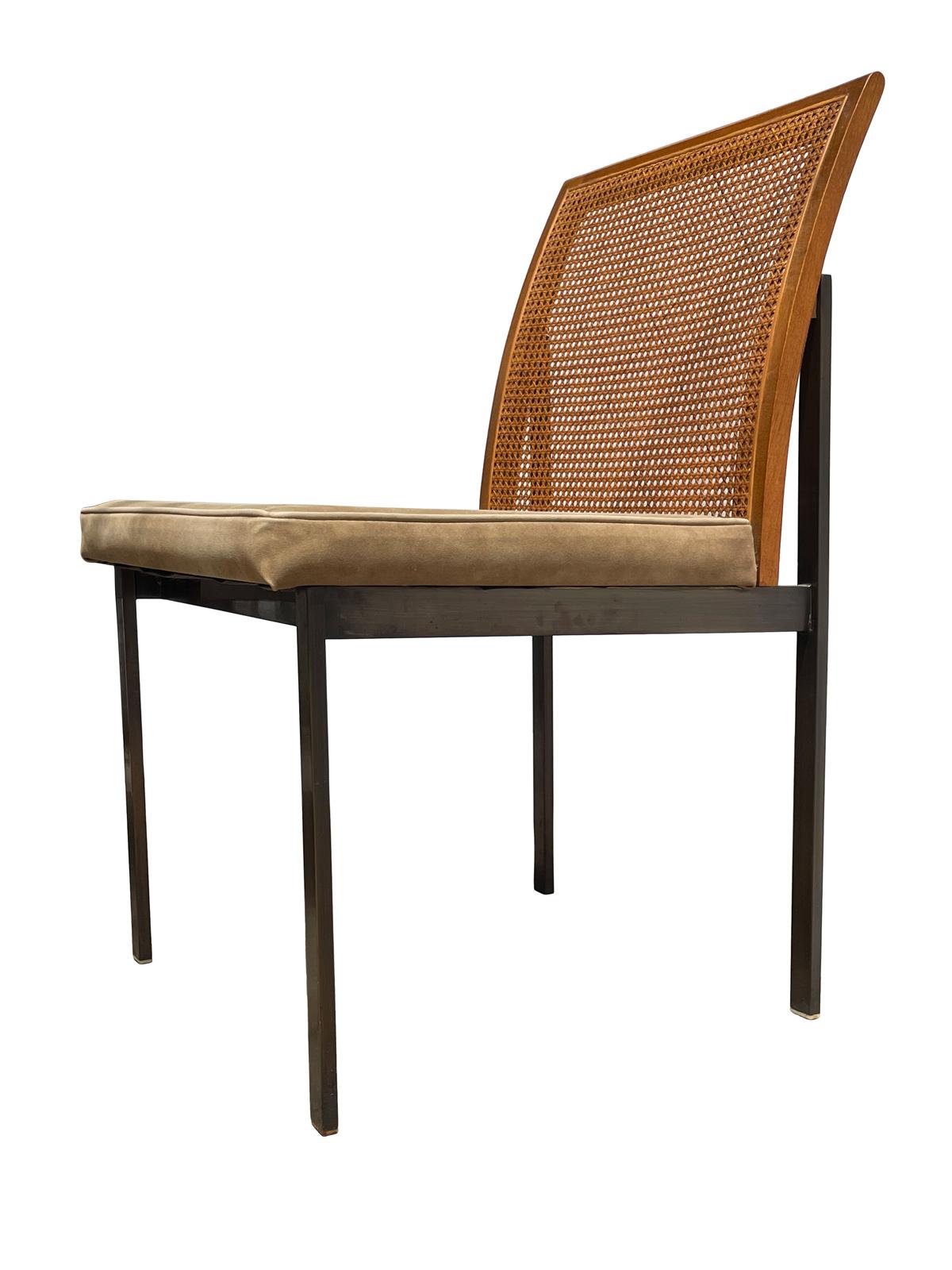 Stunning set of six dining chairs designed by Paul McCobb for Lane. The set consists of two arm chairs and four side chairs.