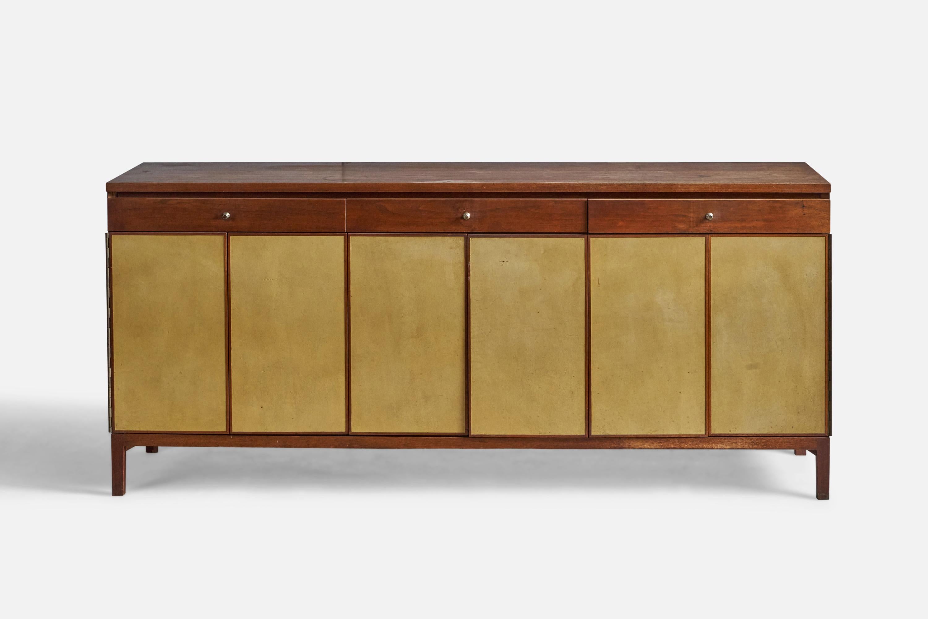 A walnut, leather and metal cabinet or credenza designed by Paul Mccobb and produced by Calvin, USA, 1950s.