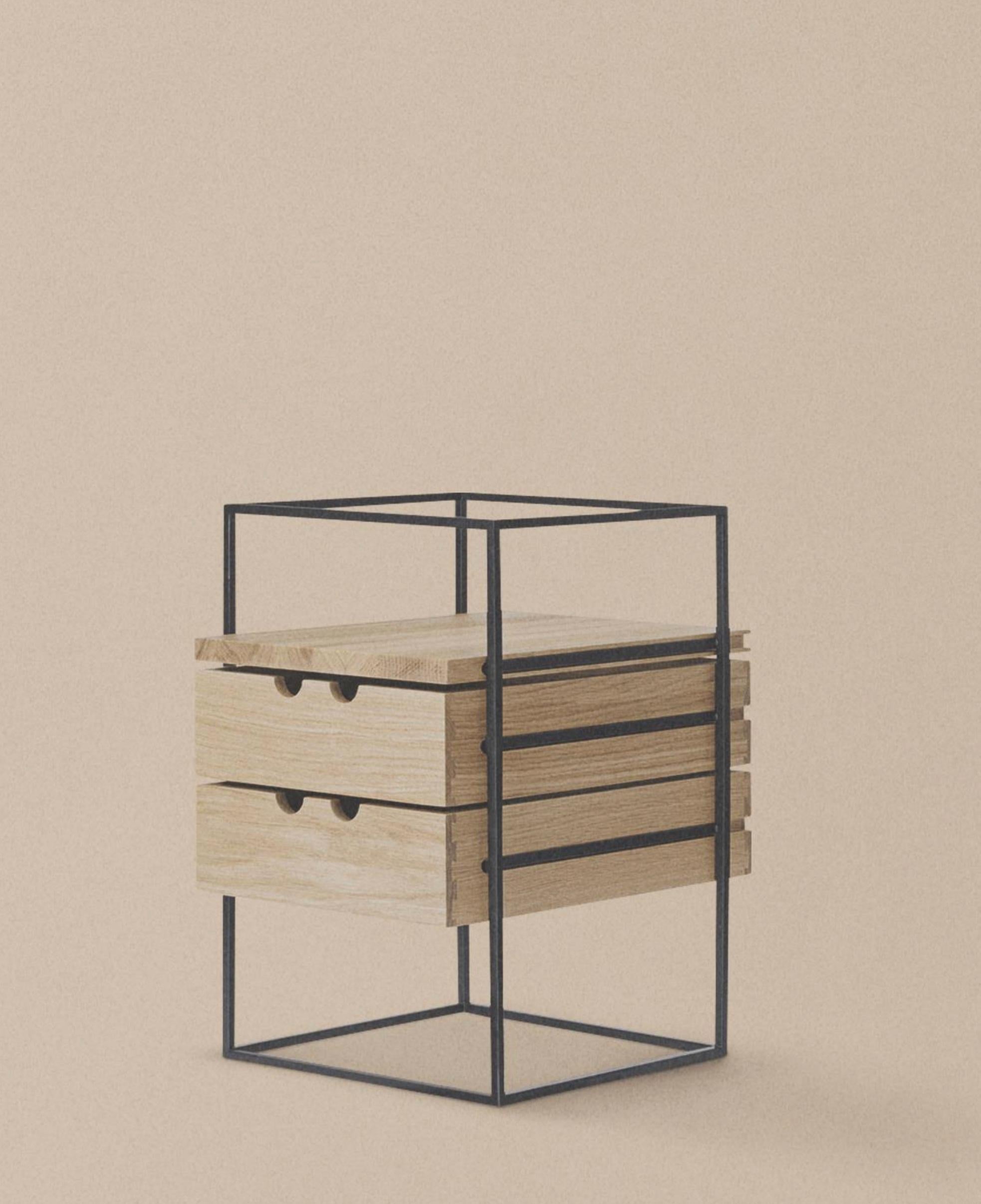 The Desk Organizer is a beautifully simplistic and easy table with slim and straight steel legs, stripped from any details or ornament, leaving only small drawers that can be mounted individually or grouped on either side of the table. 

The Desk