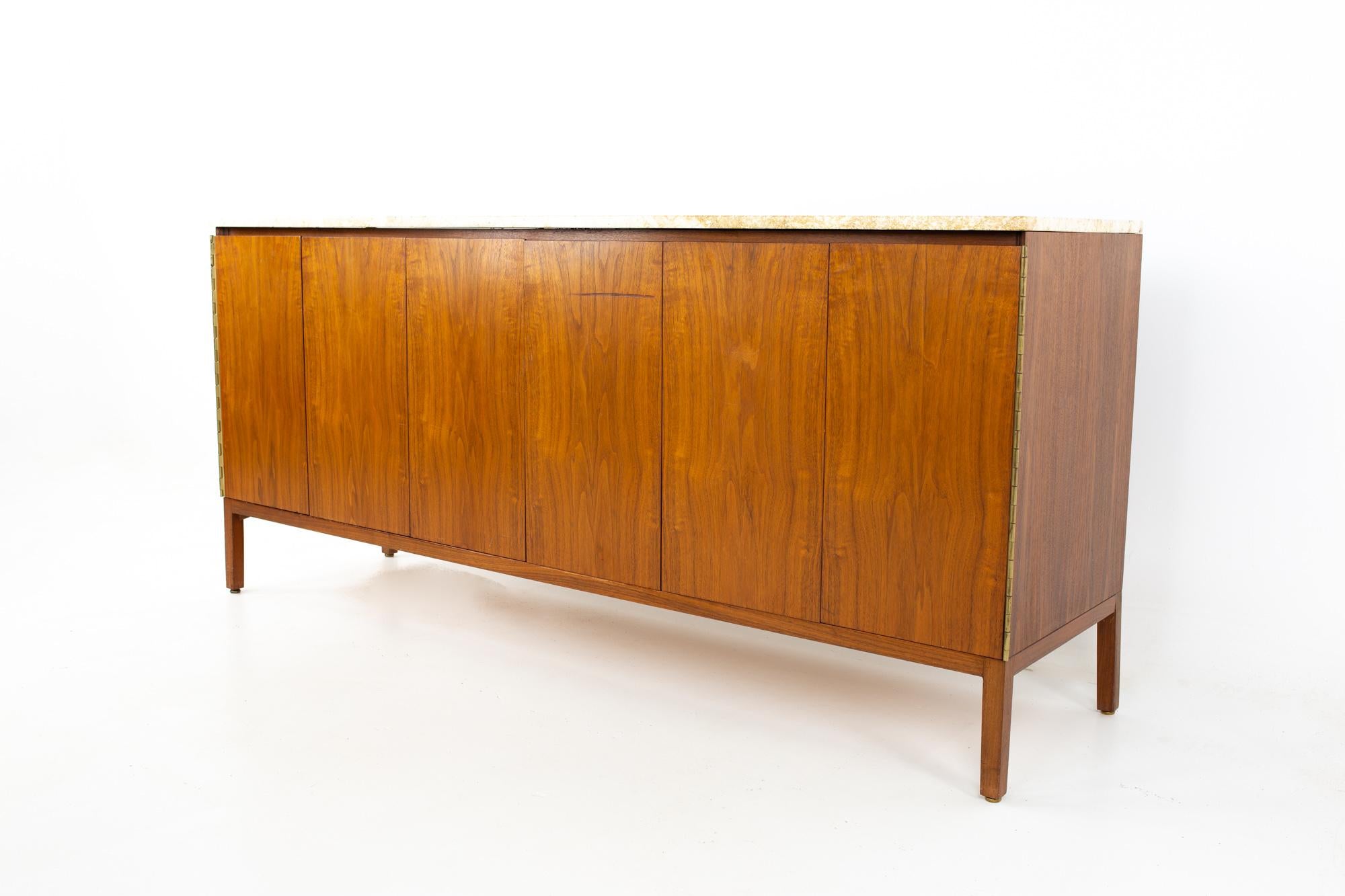 Paul McCobb for Calvin mid century walnut and Travertine marble top sideboard buffet credenza
Credenza measures: 71 wide x 19 deep x 31.25 inches high

All pieces of furniture can be had in what we call restored vintage condition. That means the