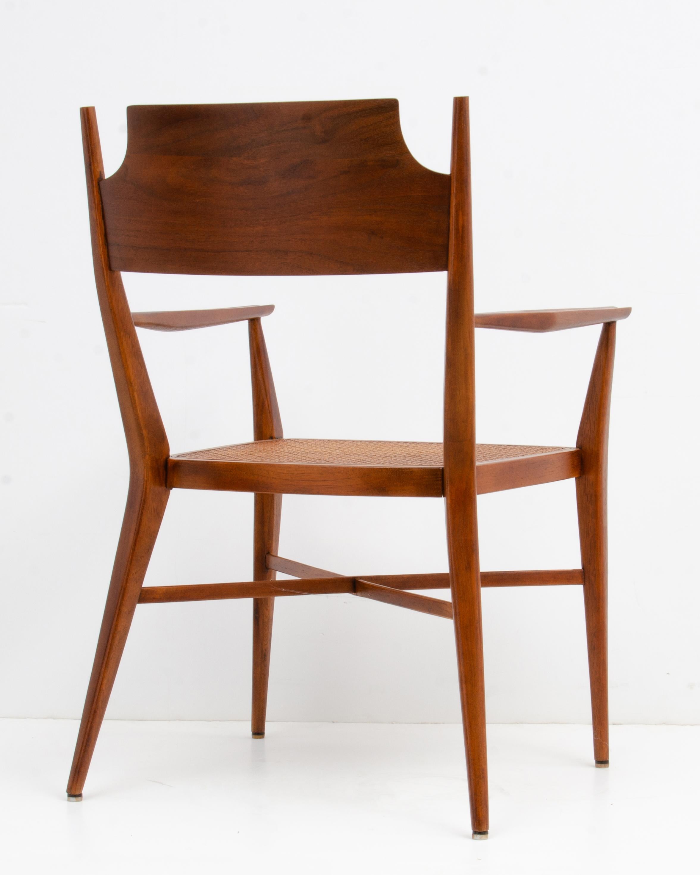 Paul McCobb Calvin Mid-Century Modern Sculpted Walnut Armchair Cane Seat In Good Condition For Sale In Forest Grove, PA