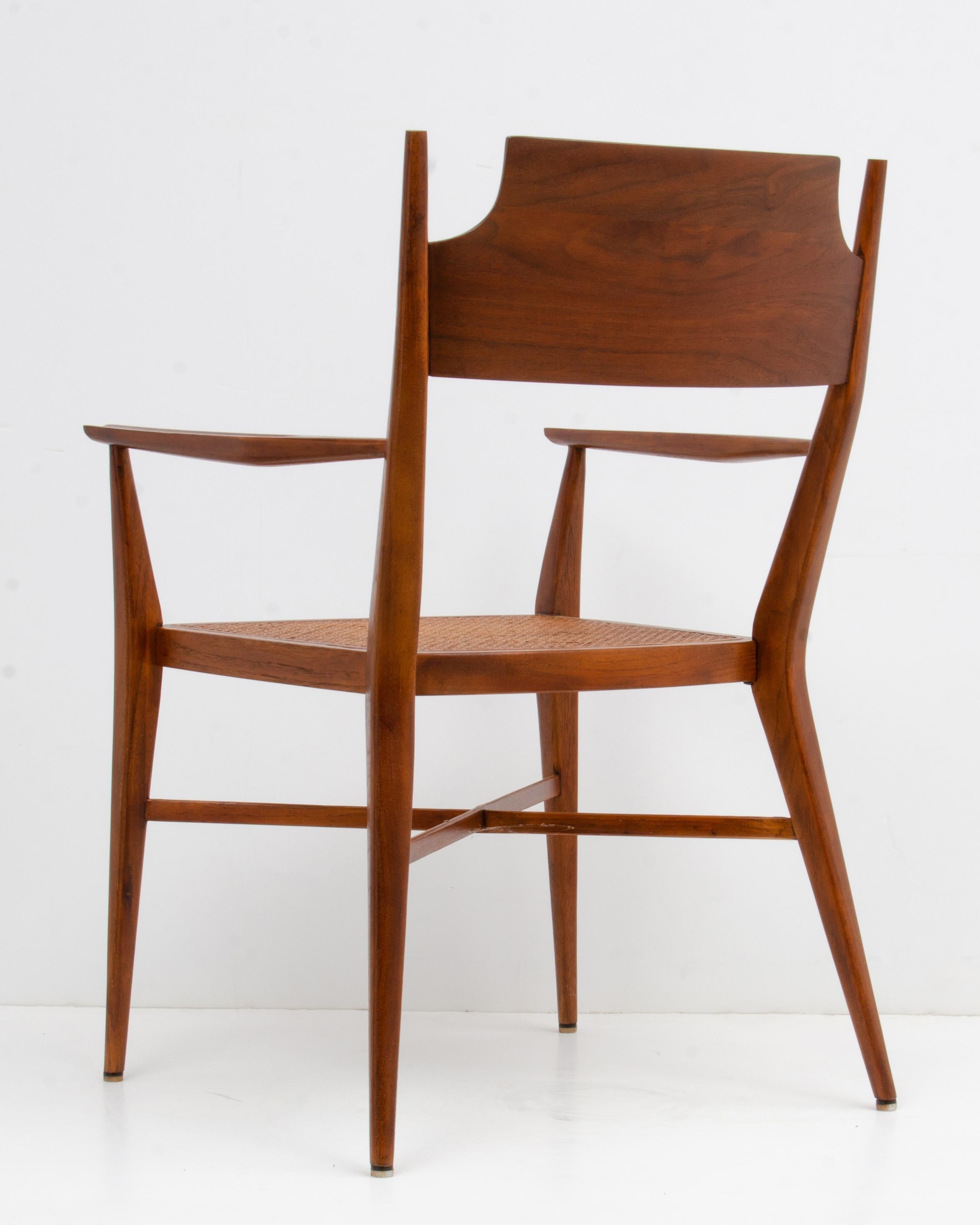 Mid-20th Century Paul McCobb Calvin Mid-Century Modern Sculpted Walnut Armchair Cane Seat For Sale