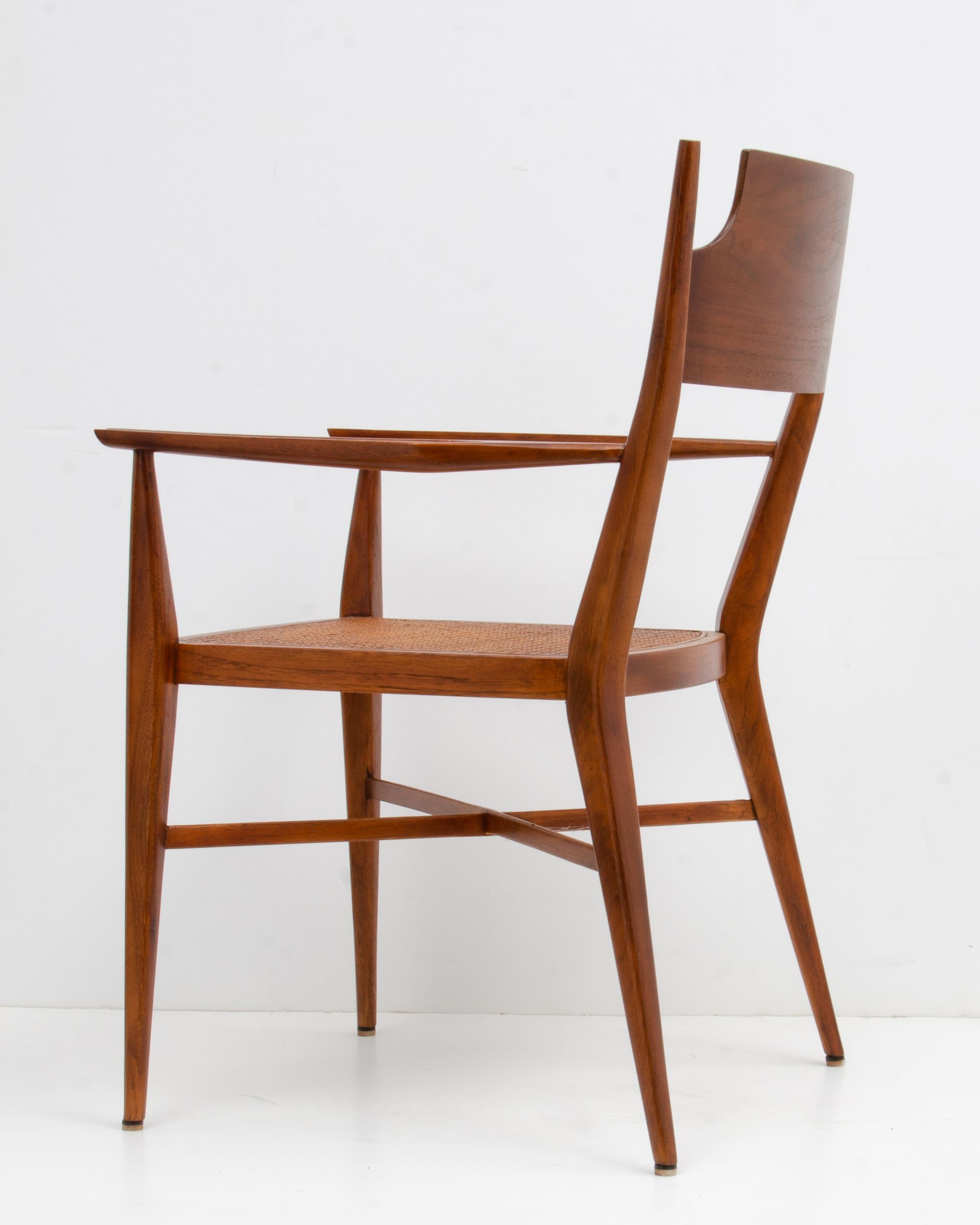 Paul McCobb Calvin Mid-Century Modern Sculpted Walnut Armchair Cane Seat For Sale 1