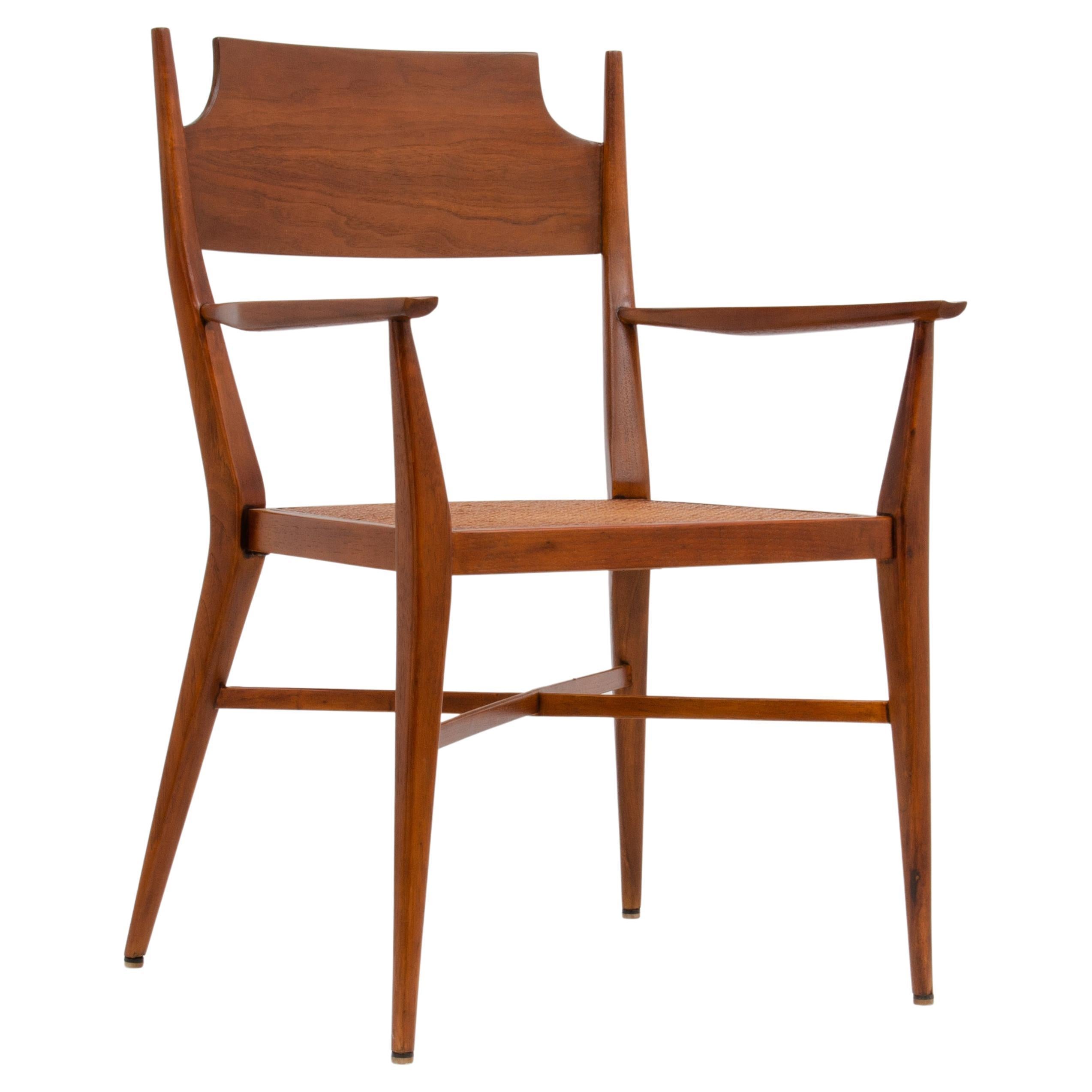 Paul McCobb Calvin Mid-Century Modern Sculpted Walnut Armchair Cane Seat For Sale