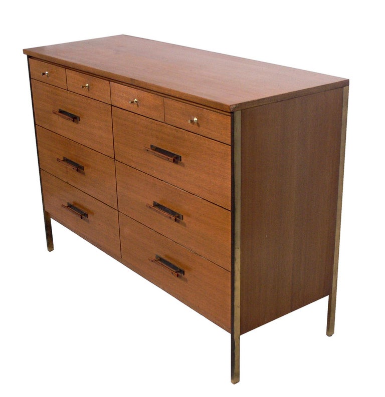 Clean lined Mid-Century Modern chest or dresser, designed by Paul McCobb for Calvin, American, circa 1950s. This piece is currently being refinished and can be completed in your choice of color. The price noted includes refinishing.