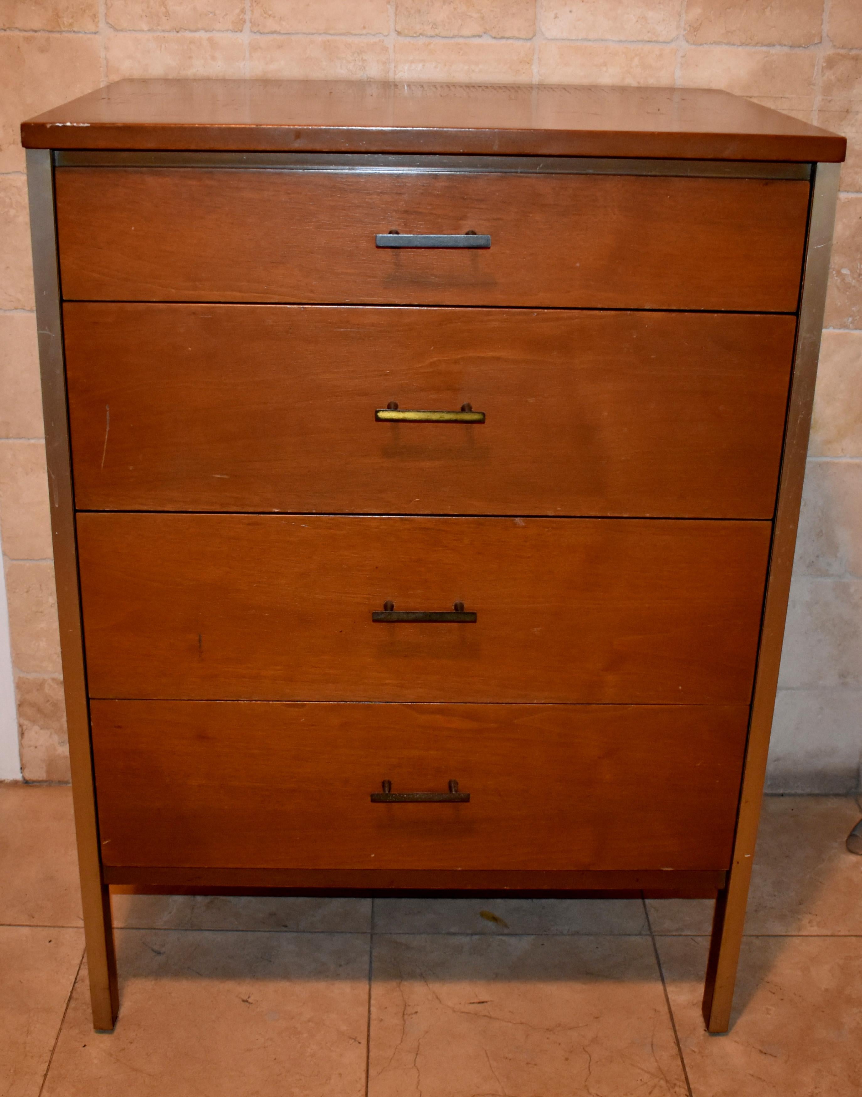 Mid-Century Modern elegant small and tall commode with four drawers made in maple wood with chrome detail design by Paul McCobb for Calvin Grand Rapids.