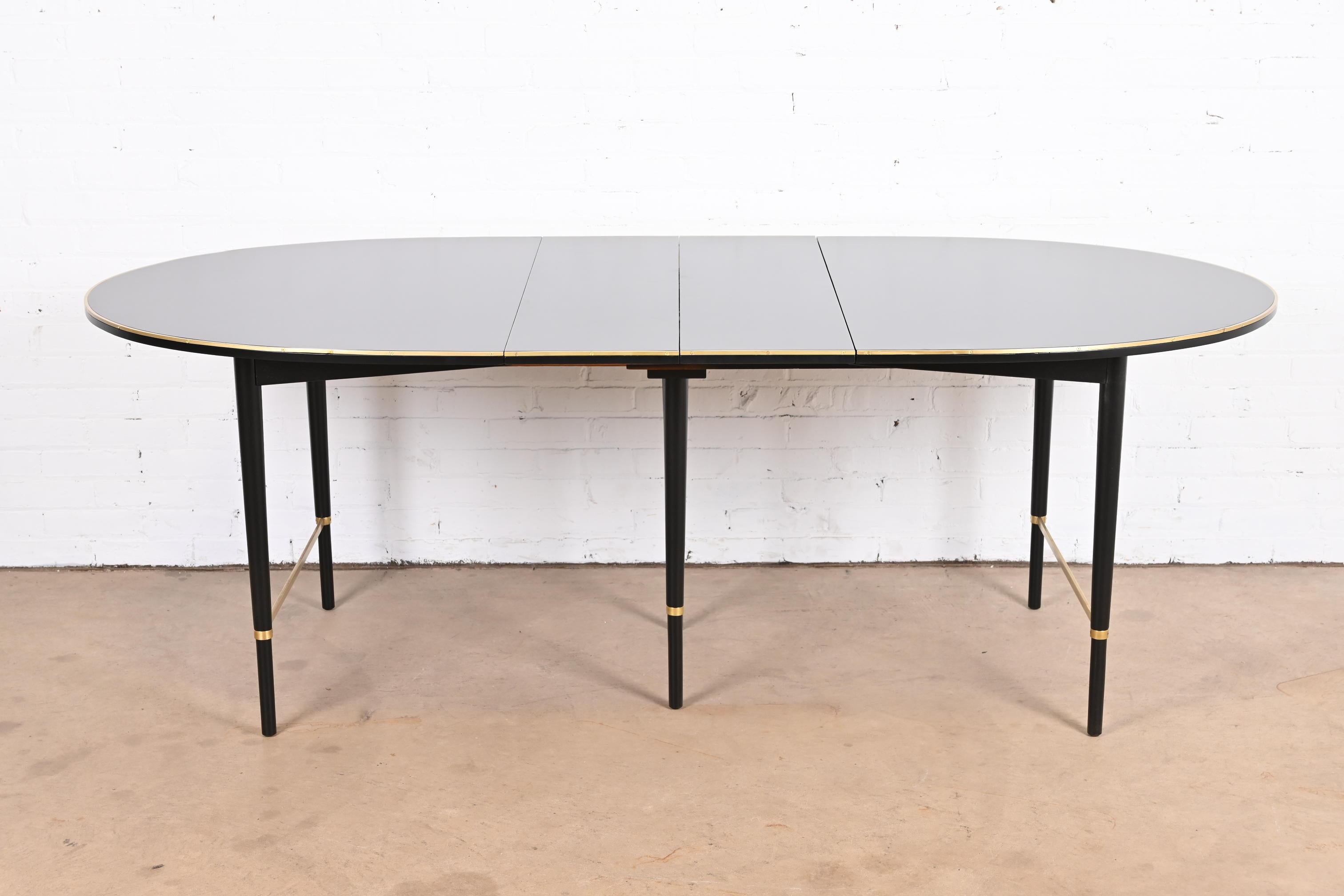 A gorgeous Mid-Century Modern extension dining table

By Paul McCobb for H. Sacks & Sons, 