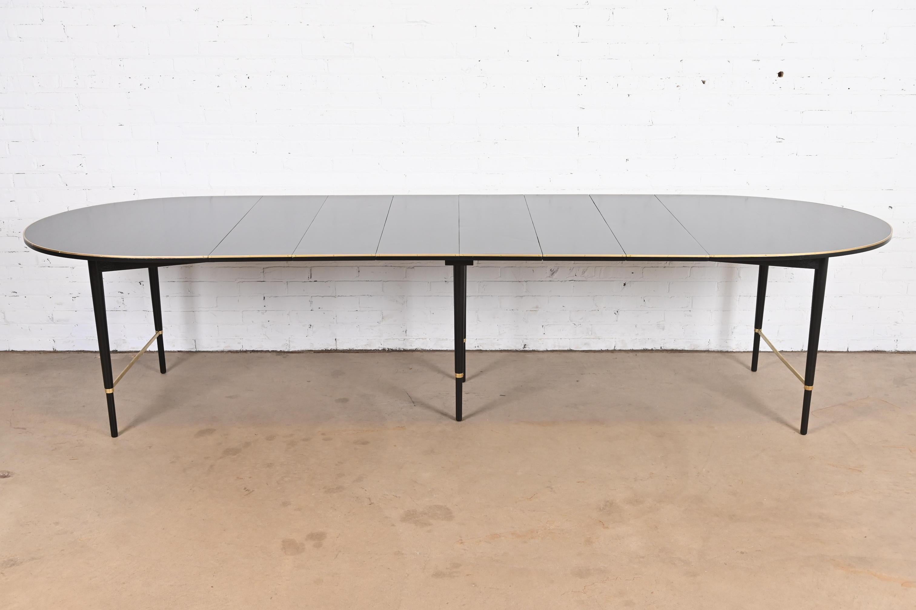 A rare and exceptional Mid-Century Modern extension dining table

By Paul McCobb for H. Sacks & Sons, 
