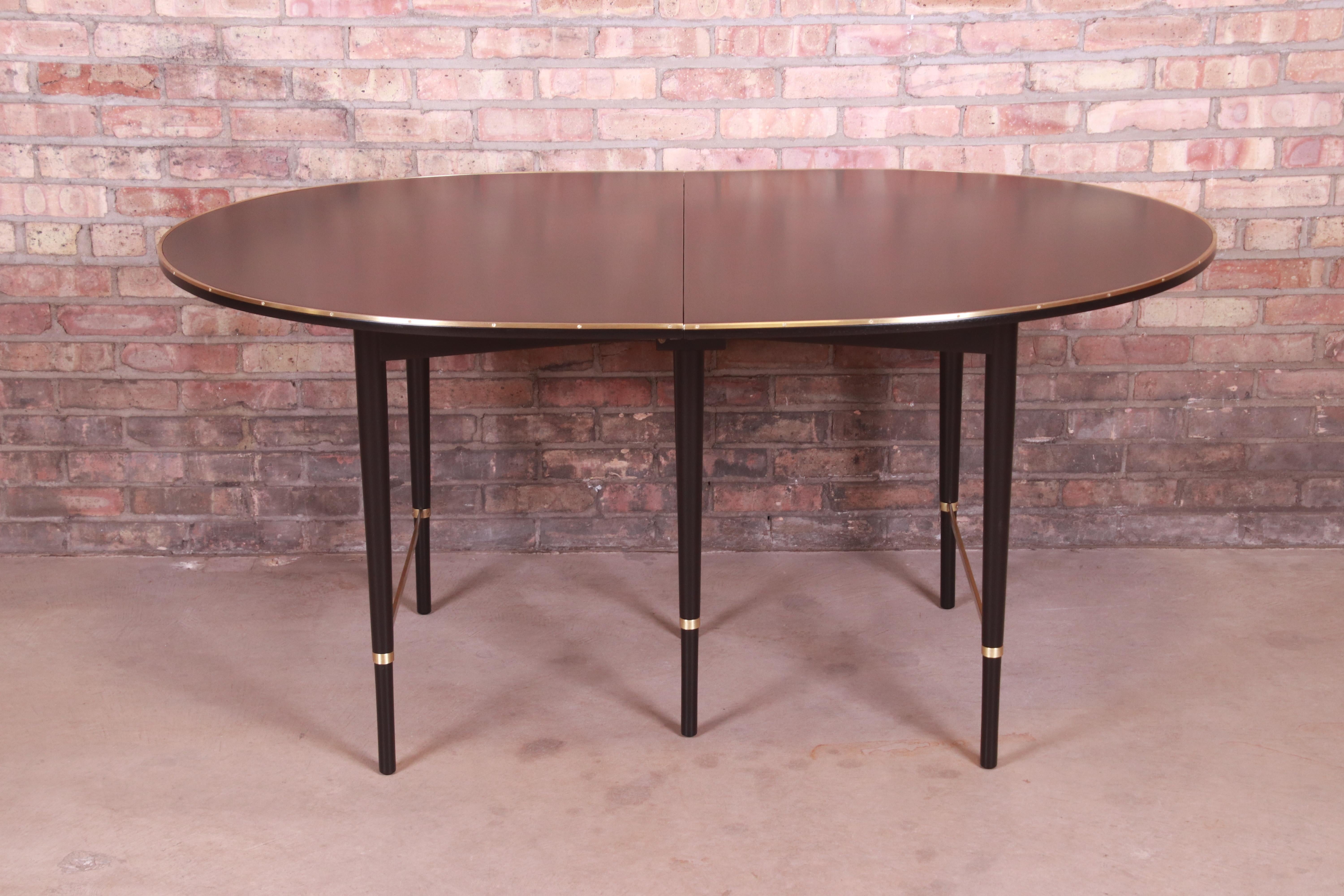 Paul McCobb Connoisseur Collection Black Lacquer and Brass Dining Table In Good Condition In South Bend, IN