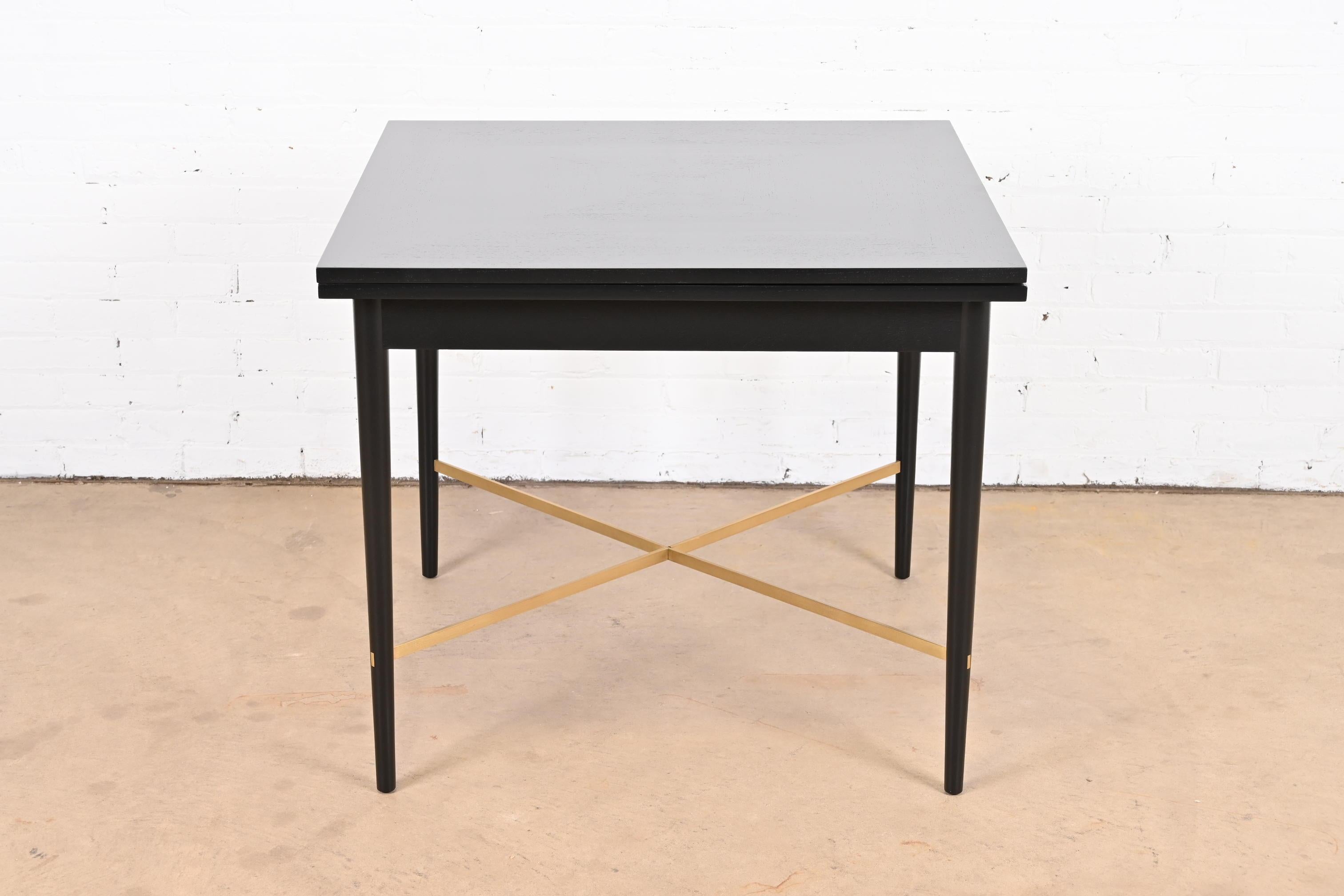 A rare and exceptional Mid-Century Modern flip top extension dining table or game table

By Paul McCobb for H. Sacks & Sons, 