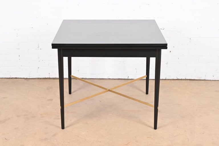 A rare and exceptional Mid-Century Modern flip top extension dining table or game table

By Paul McCobb for H. Sacks & Sons, 