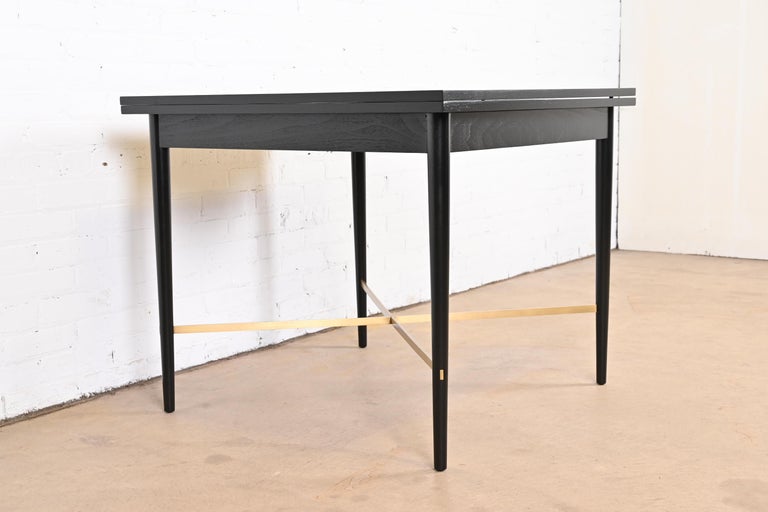 American Paul McCobb Connoisseur Collection Black Lacquer and Brass Flip Top Dining Table For Sale