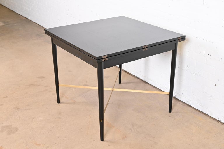 Paul McCobb Connoisseur Collection Black Lacquer and Brass Flip Top Dining Table In Good Condition For Sale In South Bend, IN