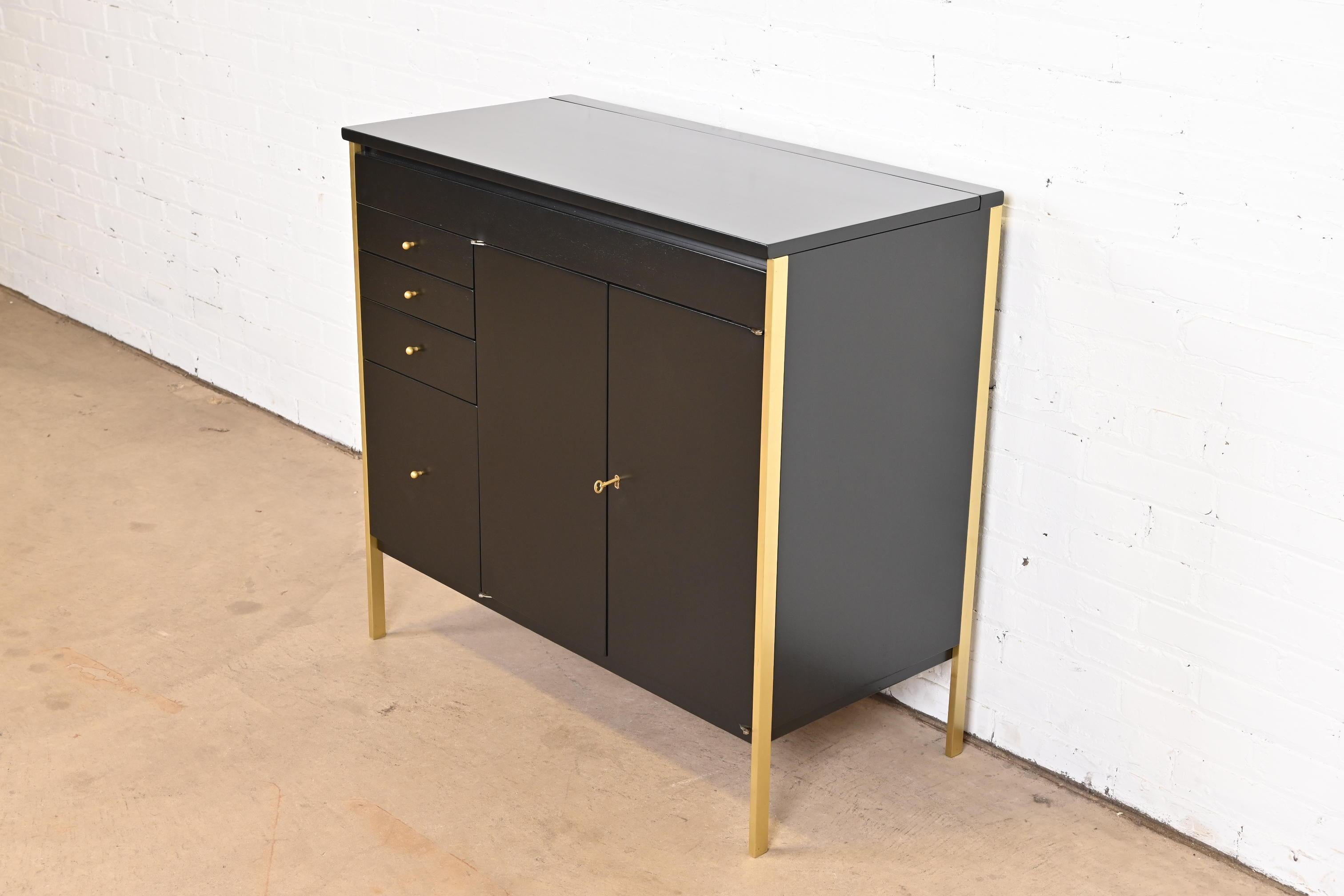 Mid-Century Modern Paul McCobb Connoisseur Collection Black Lacquer and Brass Lift Top Bar Cabinet