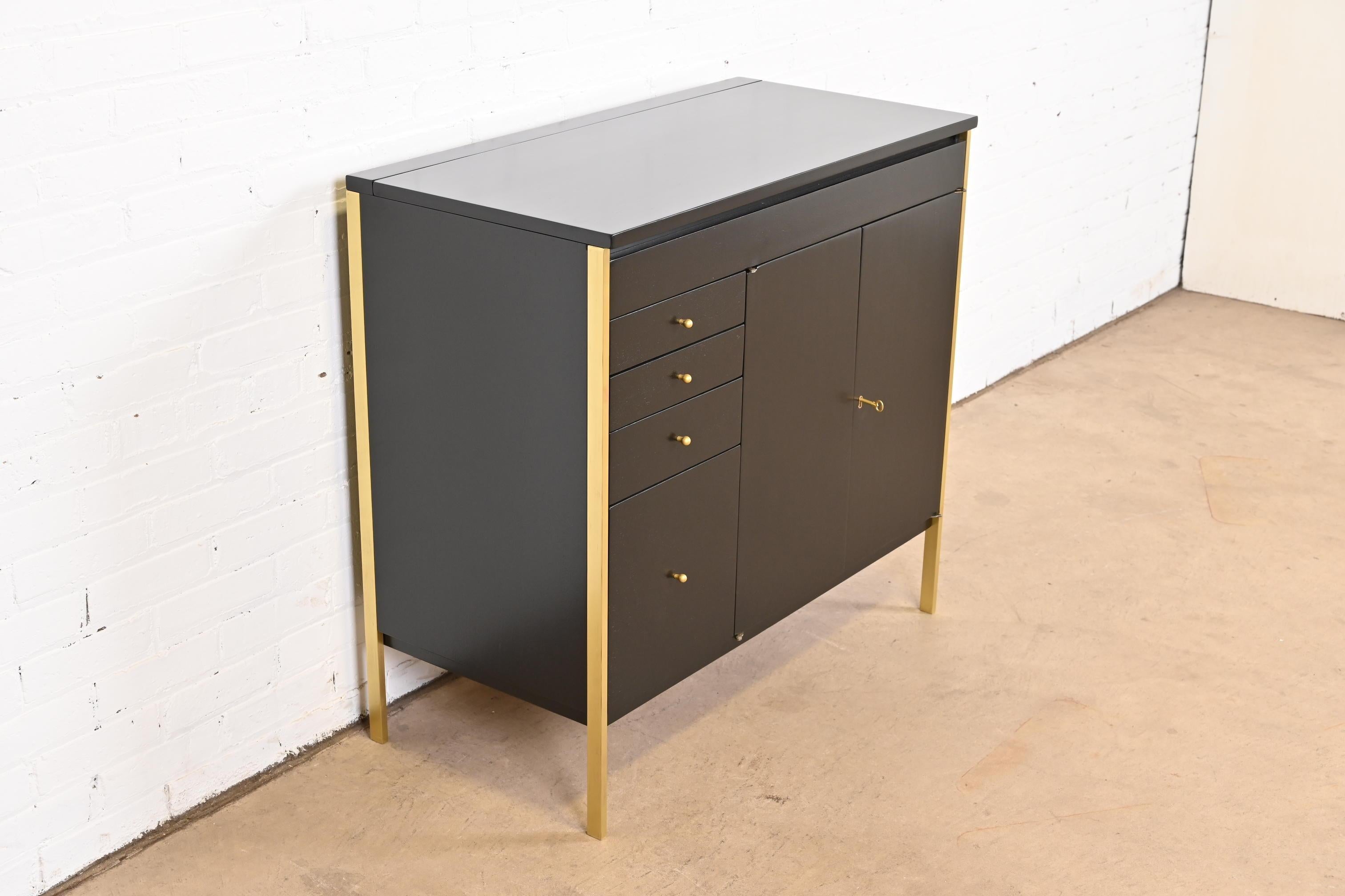 Paul McCobb Connoisseur Collection Black Lacquer and Brass Lift Top Bar Cabinet In Good Condition In South Bend, IN
