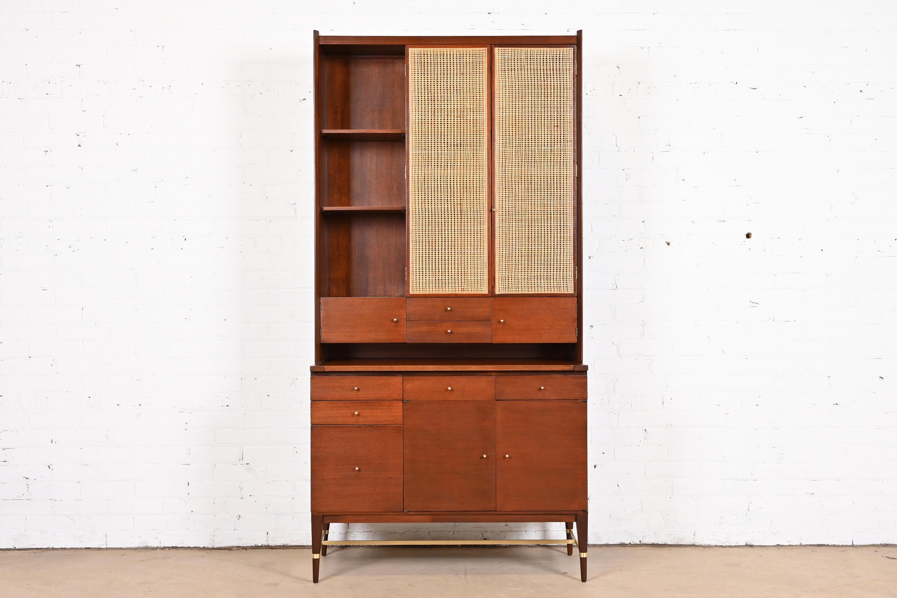A rare and exceptional Mid-Century Modern bar cabinet or secretary desk with bookcase hutch top

By Paul McCobb for H. Sacks & Sons, 
