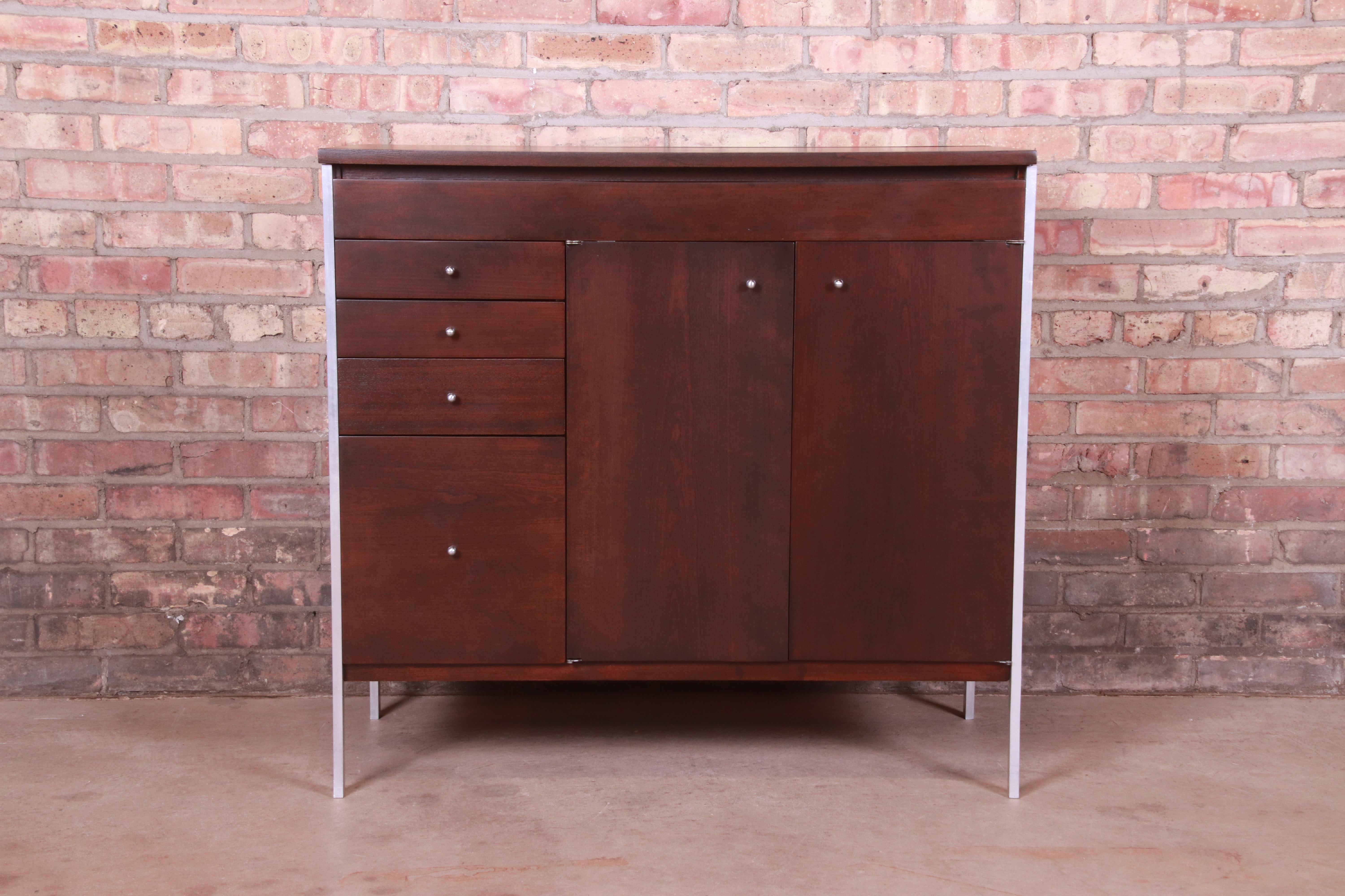 A rare and exceptional Mid-Century Modern lift top bar cabinet

By Paul McCobb for H. Sacks & Sons, 