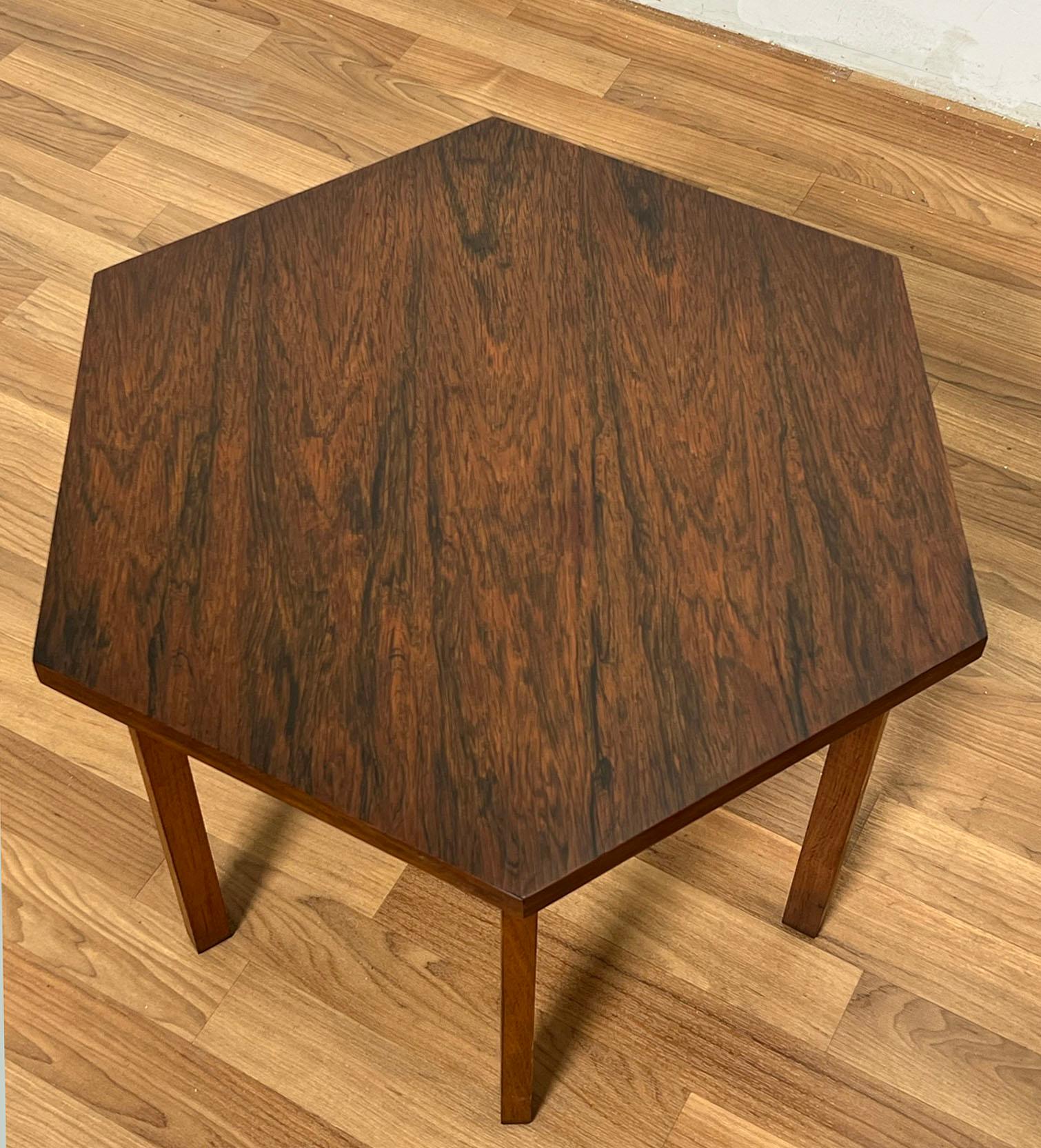 Hexagonal occasional table in rosewood designed by Paul McCobb for Lane's Delineator line, circa 1960s.